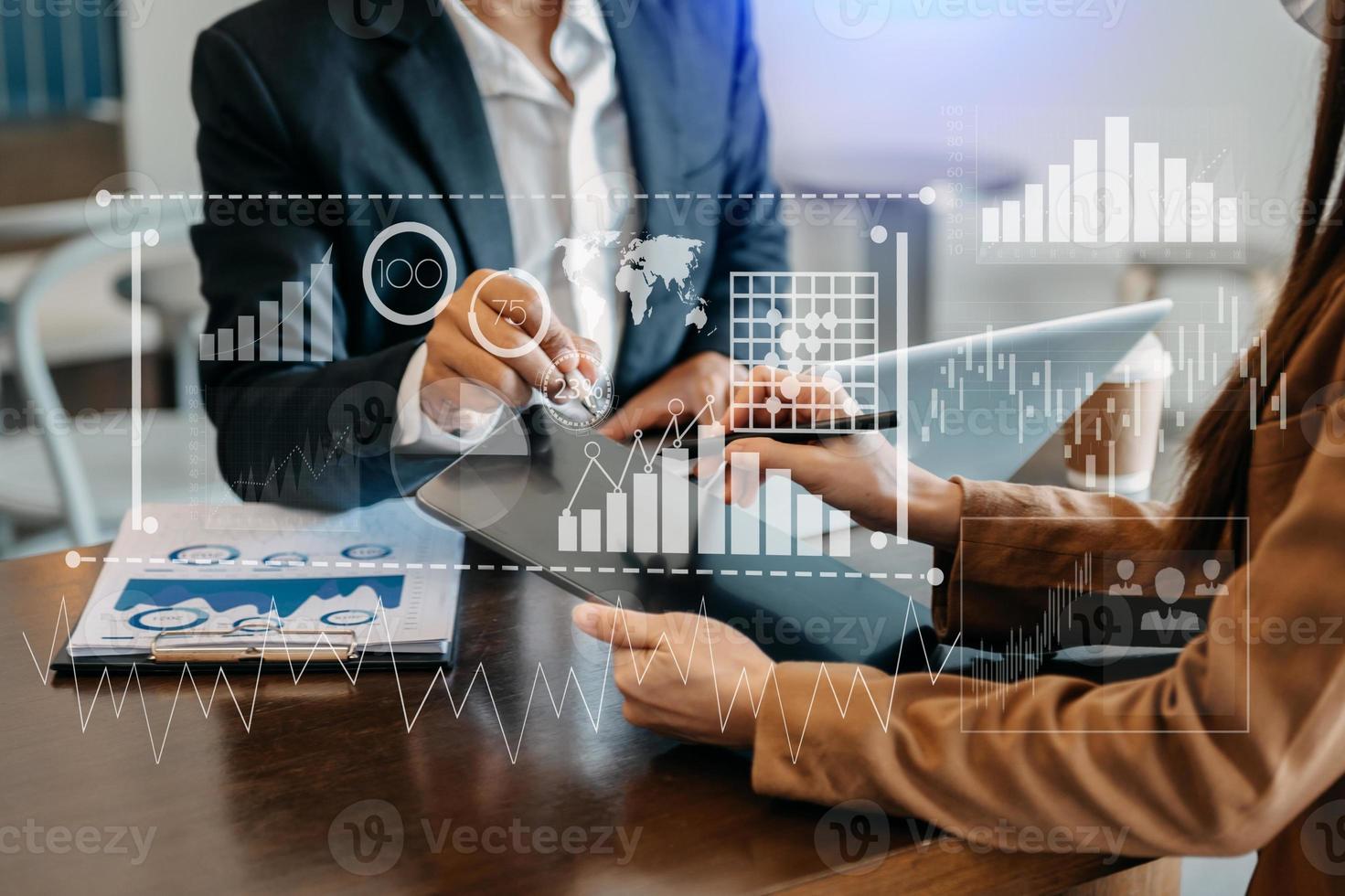 Businessman hand Project manager working and update tasks and Gantt chart scheduling virtual diagram.with smart phone, tablet and laptop in office. photo