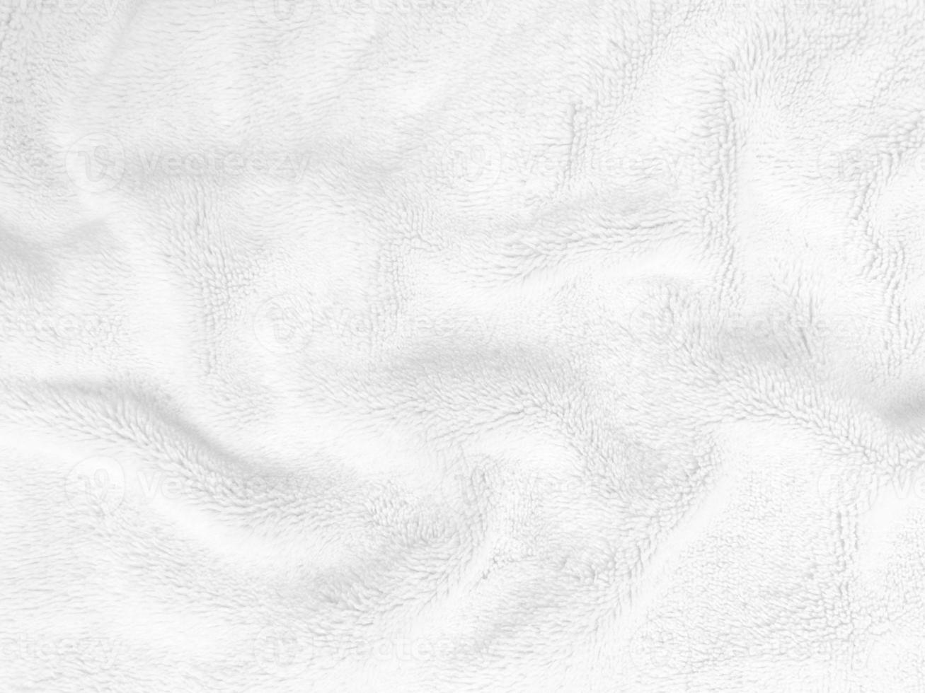 White clean wool texture background. light natural sheep wool. white seamless cotton. texture of fluffy fur for designers. close-up fragment white wool carpet. photo