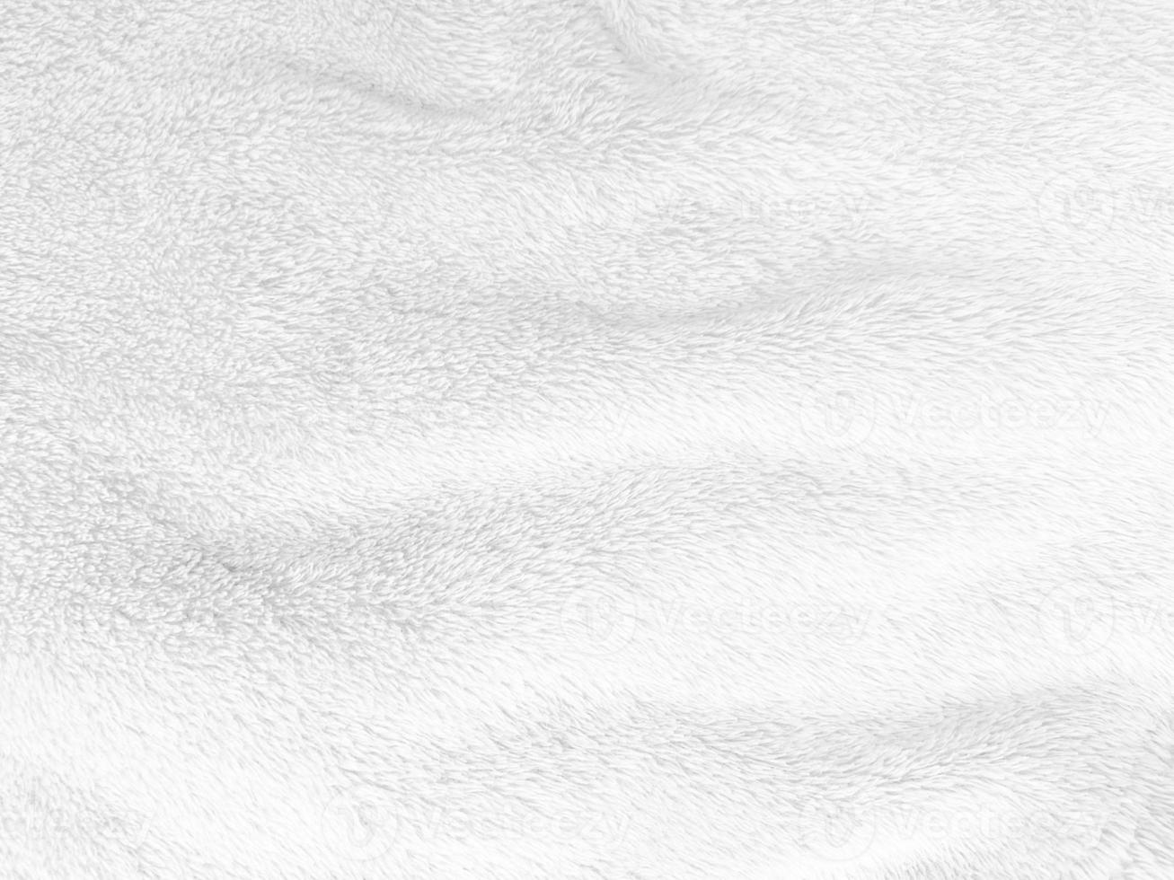 White clean wool texture background. light natural sheep wool. white seamless cotton. texture of fluffy fur for designers. close-up fragment white wool carpet. photo