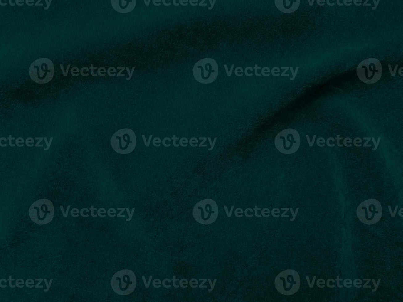 Dark green old velvet fabric texture used as background. Empty green fabric background of soft and smooth textile material. There is space for text. photo