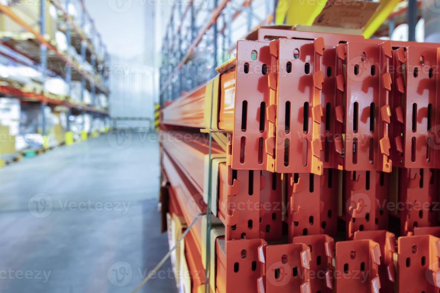 Warehouse premises of a factory or workshop with metal shelves. photo