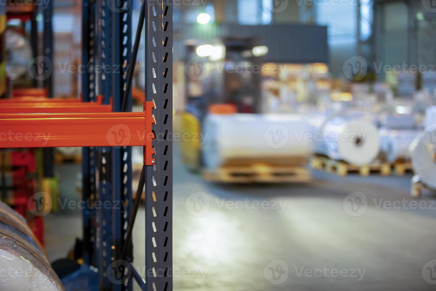 Metal shelves for storage on the background of a warehouse. photo