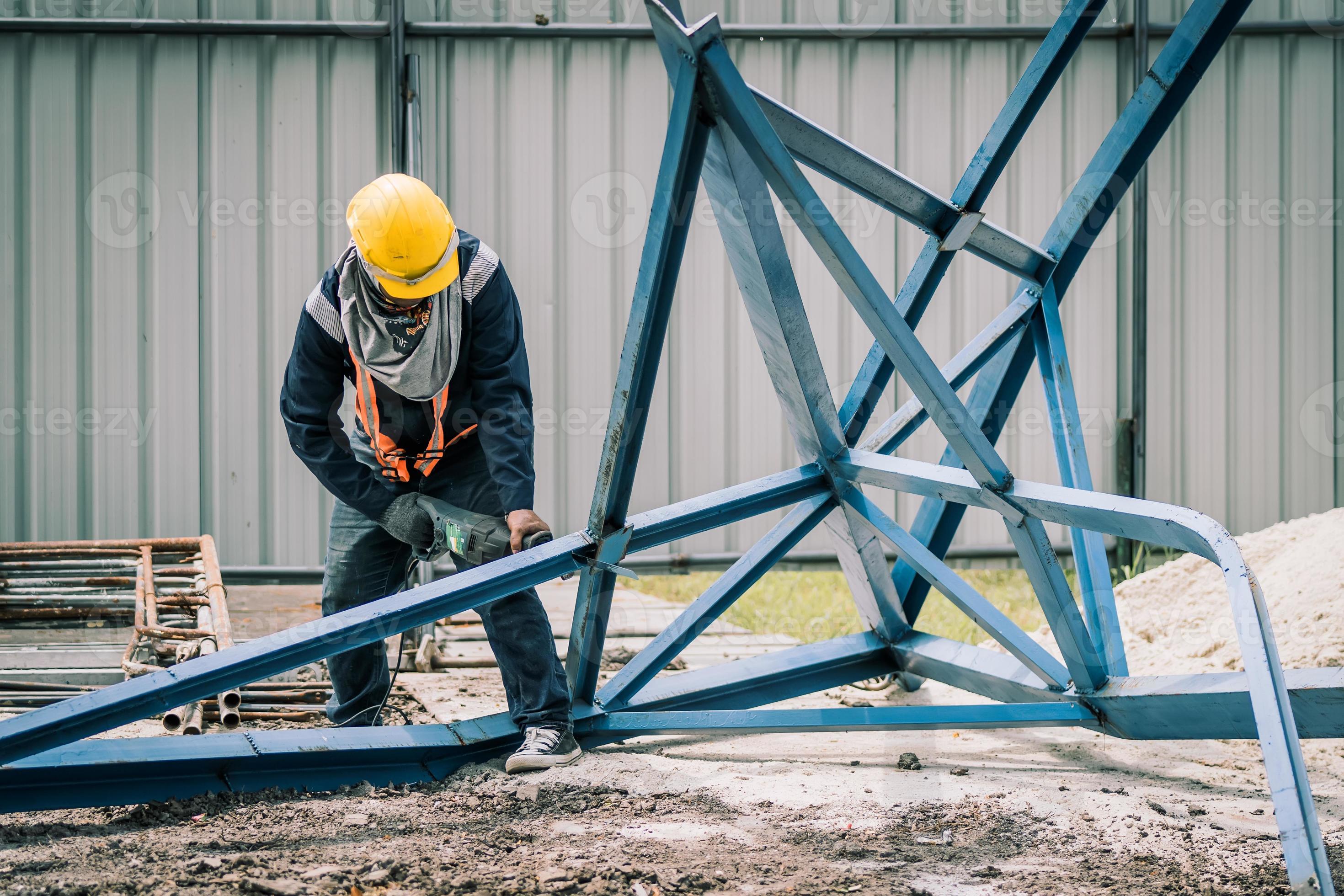 worker to cutting steel in construction site with Reciprocating saw or