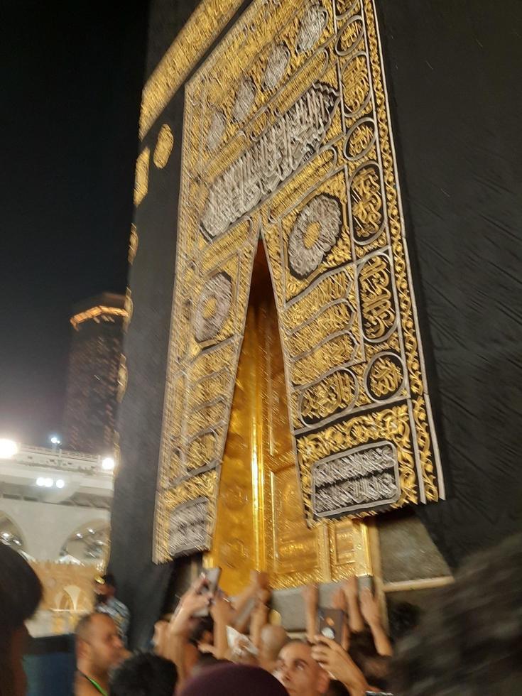 Mecca, Saudi Arabia, March 2023 - Beautiful view of the Kaaba and the entrance to the Kaaba in the Masjid Al Haram in Mecca. photo