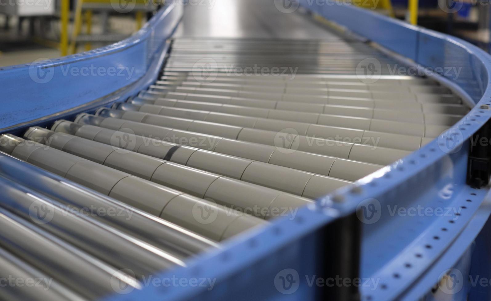 Conveyor belt inside a manufacturing site or distribution warehouse photo