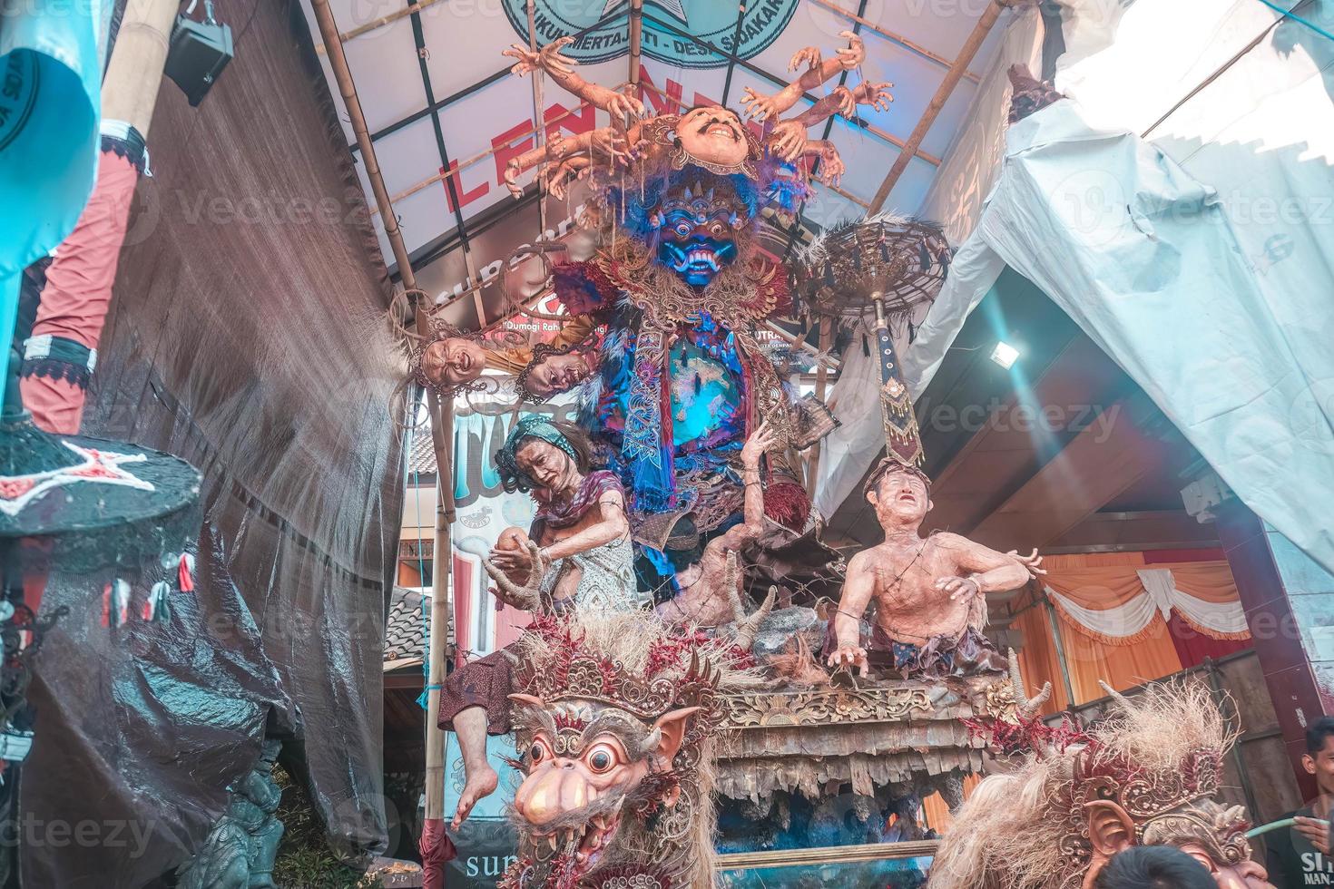 Ogoh-ogoh is a Balinese traditional giant puppet made of bamboo and paper mache, representing evil spirits. It's paraded around before the Nyepi Day to ward off negativity. photo