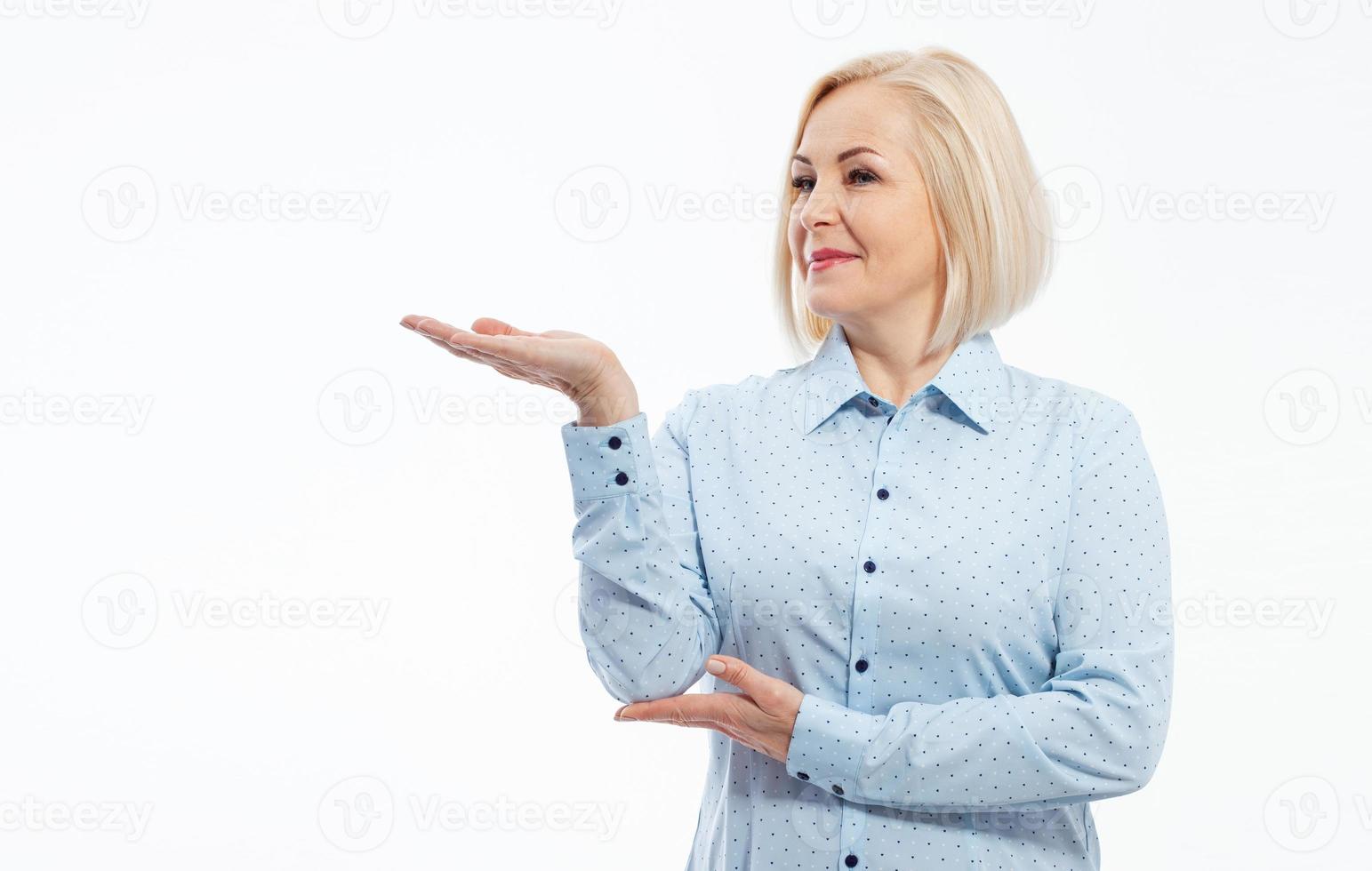 Business lady hold open hand new product open palm empty space sales manager wear specs shirt isolated white background photo