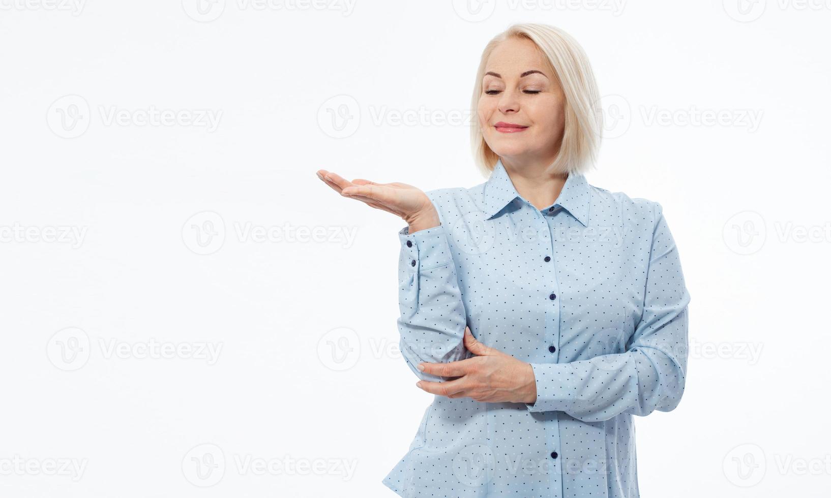 Business lady hold open hand new product open palm empty space sales manager wear specs shirt isolated white background photo
