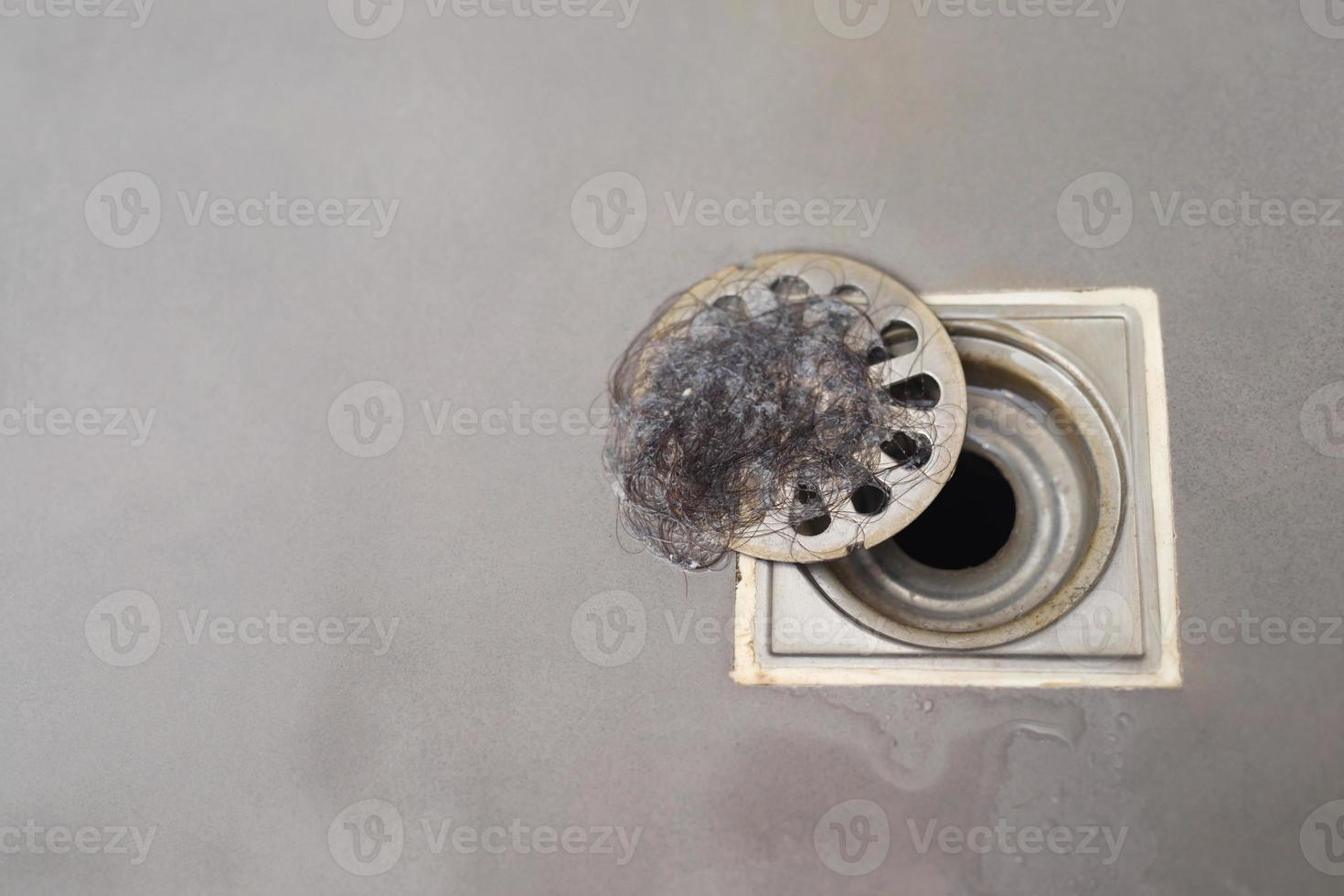 clogged pipe, anti-odor strainer with foul-smelling garbage in the bathroom photo