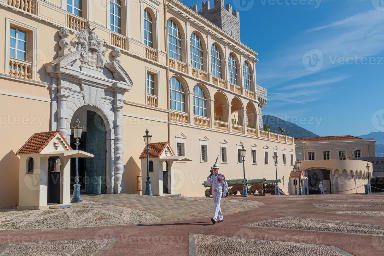 Monte Carlo - guard with Summer uniform walking in front of the Royal Palace photo