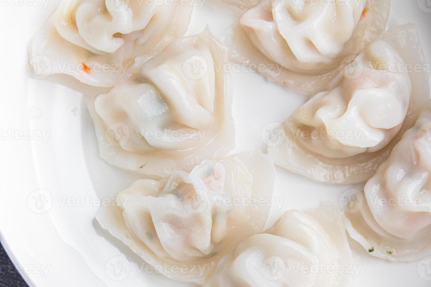 dumplings dim sum rice flour dough Chinese food meal snack on the table copy space food background rustic top view photo