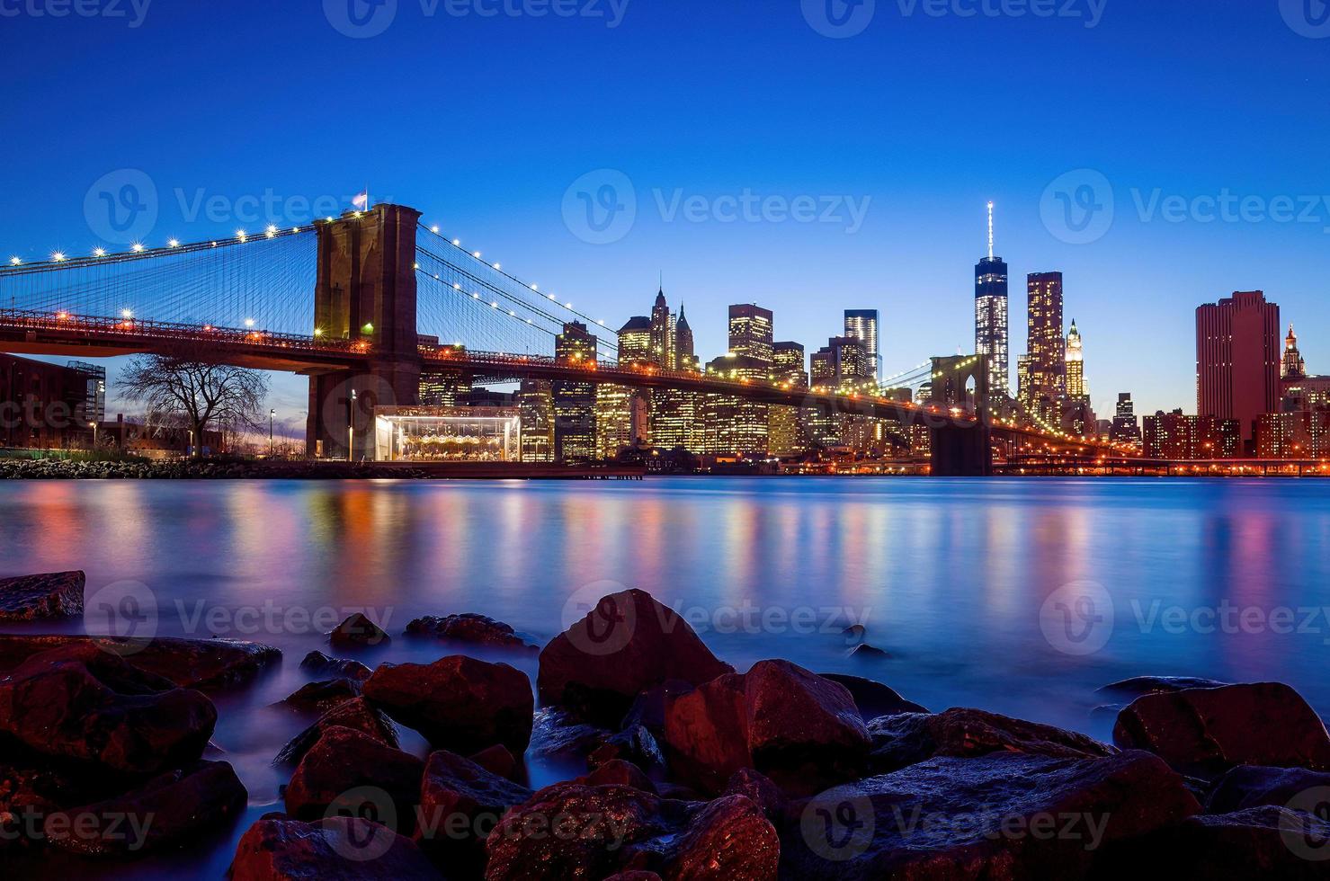 Manhattan city skyline cityscape of New York with Brooklyn Bridge photo