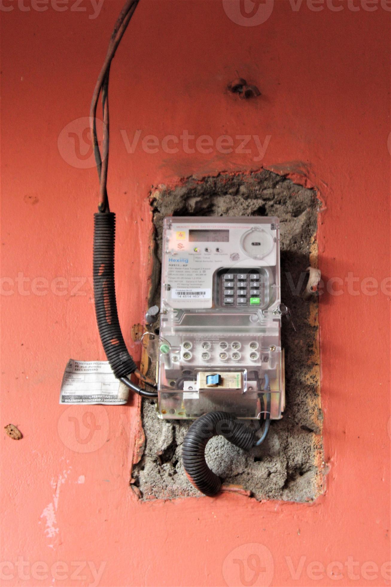electricity meter in front of a local resident's house 21857740 Stock