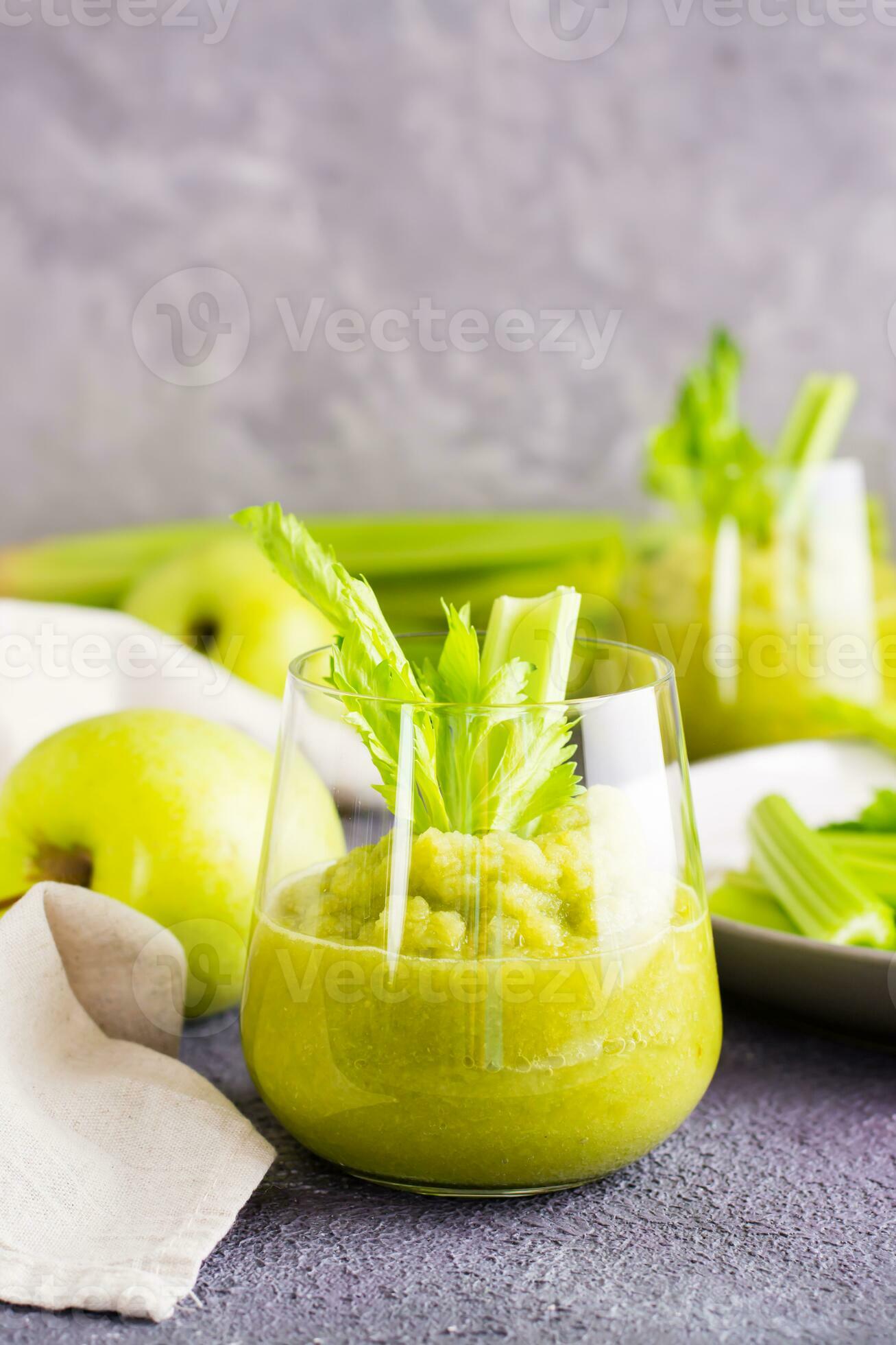 Fresh celery and green apple smoothie in glasses and cooking