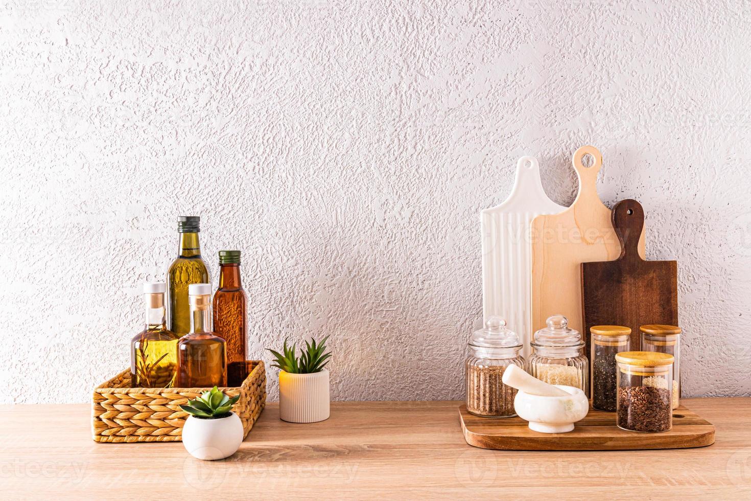 Beautiful kitchen background in a minimalist style with two stylish ceramic  mugs and cutting boards Stock Photo by mmoskalyuk160462