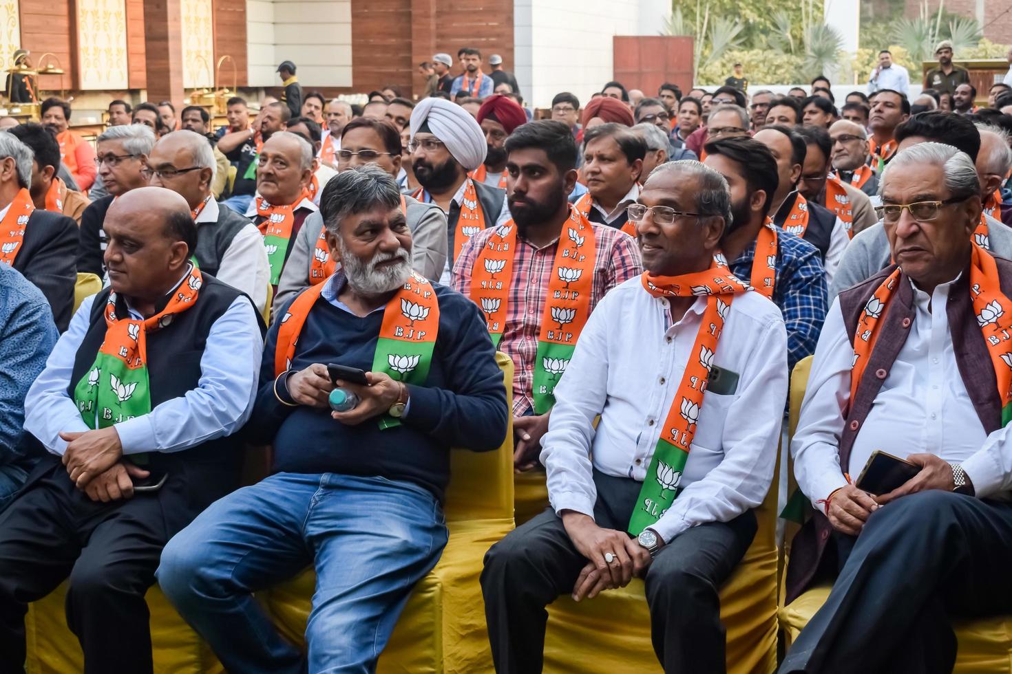 Delhi, India, December 02 2022 -Bharatiya Janata Party - BJP supporter during mega road show in support of BJP candidate Pankaj Luthara to file nomination papers ahead of MCD local body Elections 2022 photo
