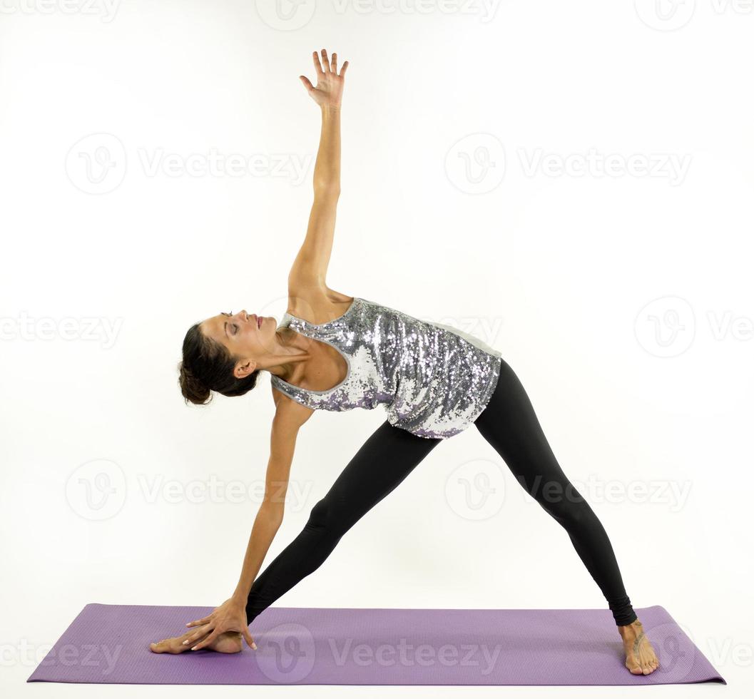 beautiful yoga woman against white photo