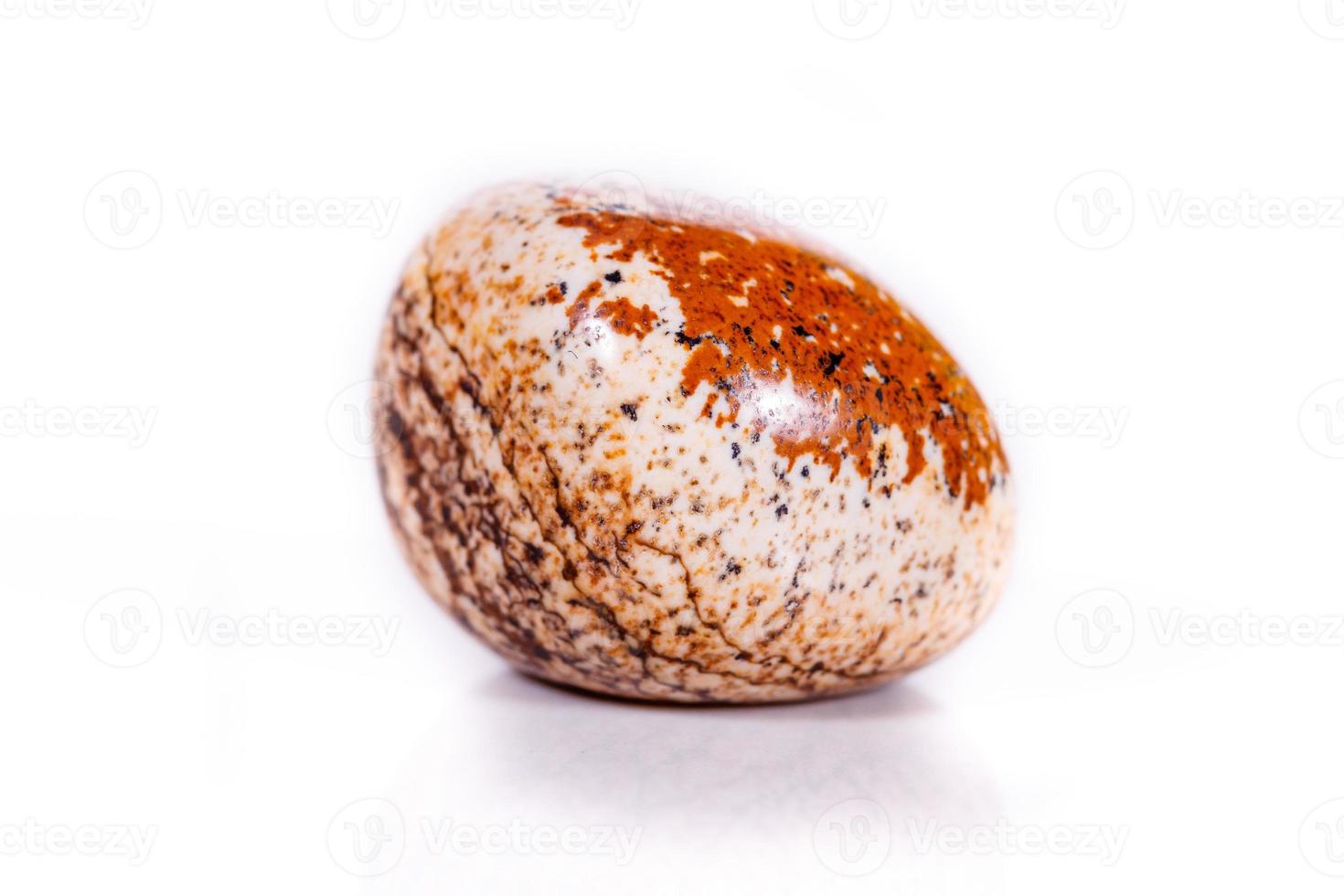 Macro mineral rock jasper landscape sandy on white background photo