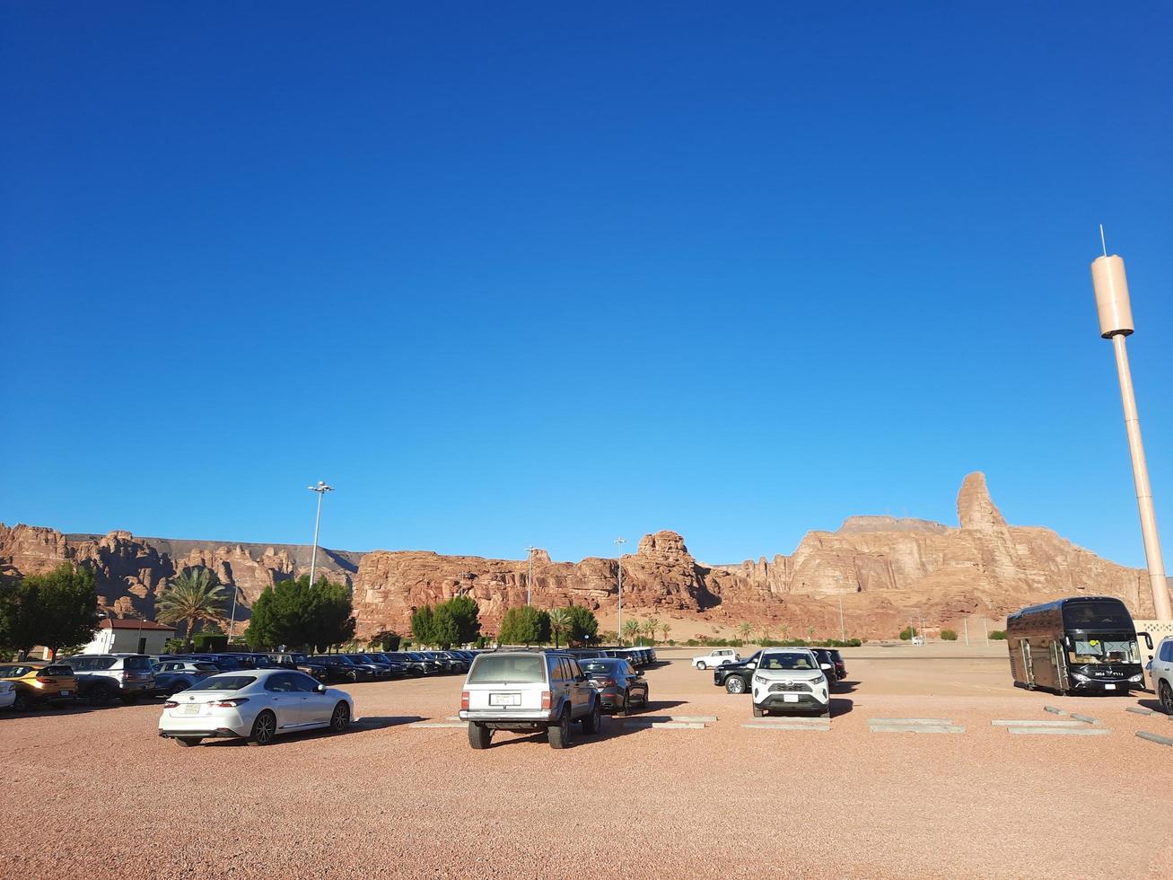 Al Ula, Saudi Arabia, March 2023 - Jeeps are parked at different places in the desert to take tourists to different places during the day in Al Ula, Saudi Arabia. photo