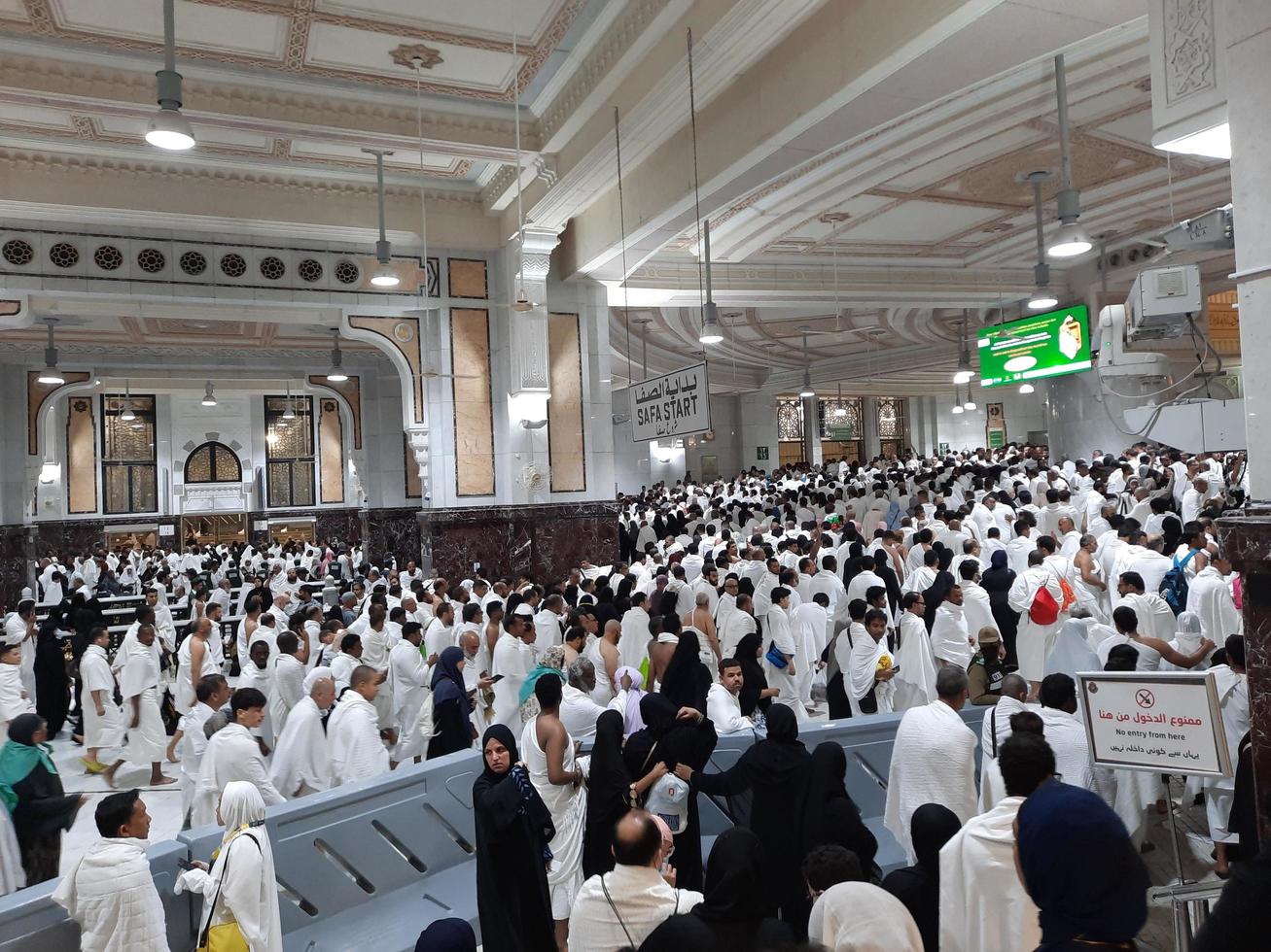 Mecca, Saudi Arabia, March 2023 - Pilgrims walk between the hills of