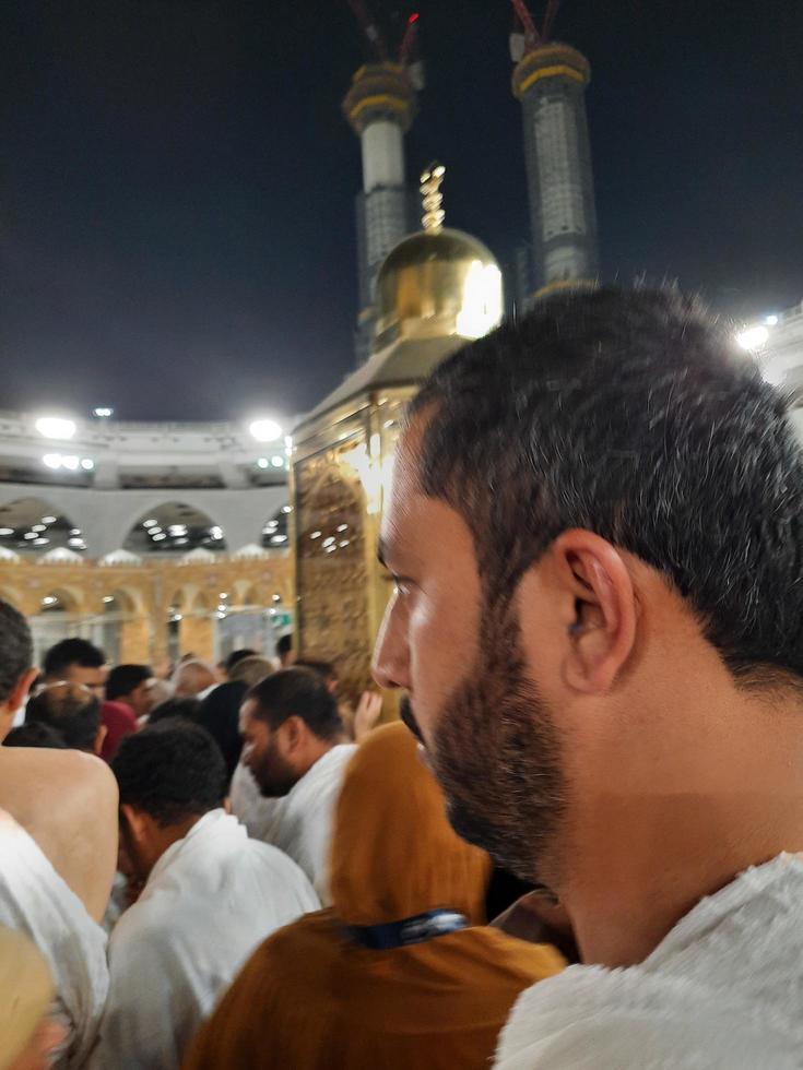 Mecca, Saudi Arabia, March 2023 - During the month of Ramadan, pilgrims from all over the world perform Tawaf around the Kabah at the Masjid al-Haram in Mecca.. photo