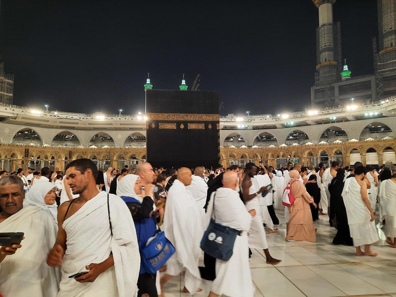 Mecca, Saudi Arabia, March 2023 - During the month of Ramadan, pilgrims from all over the world perform Tawaf around the Kabah at the Masjid al-Haram in Mecca.. photo