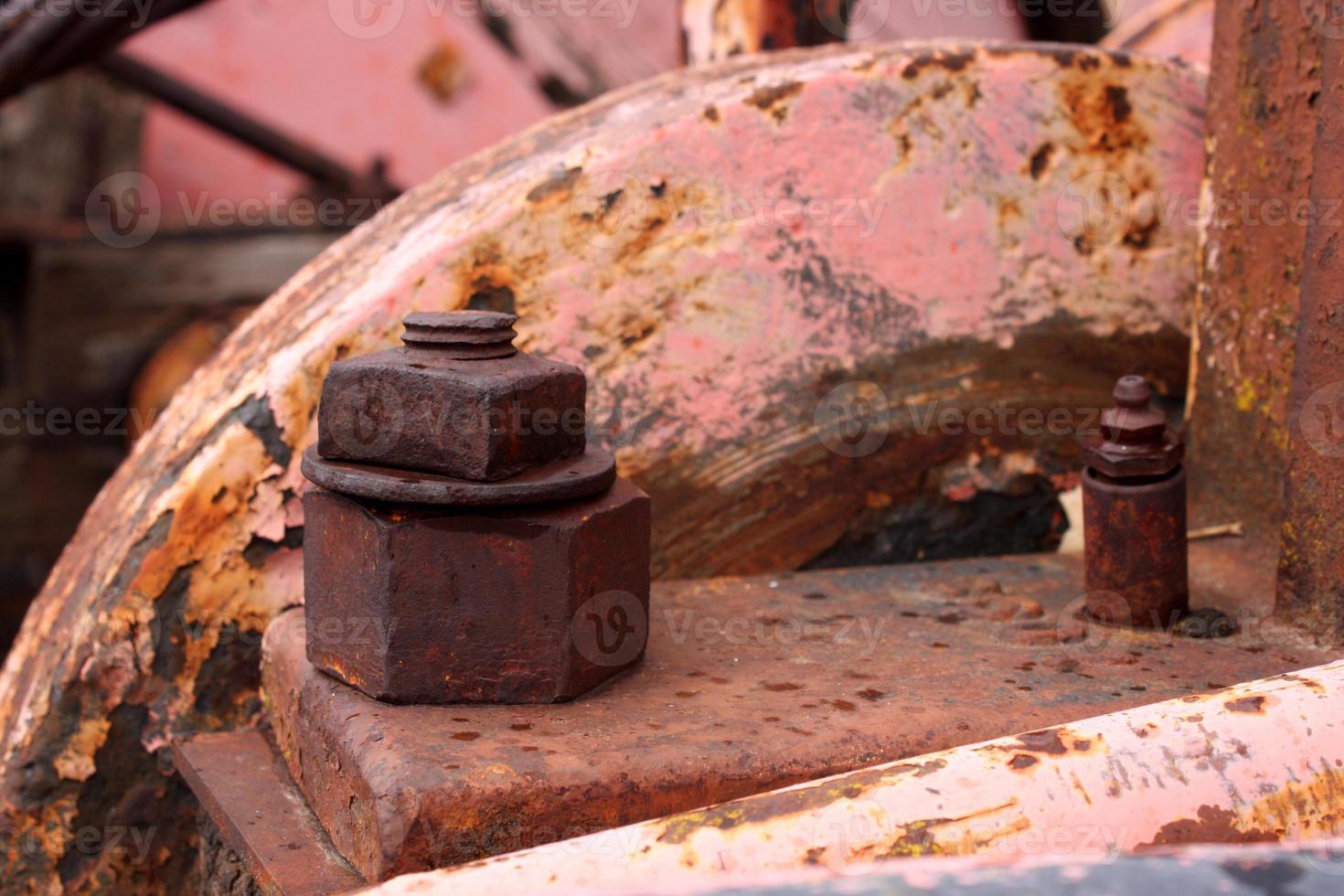 Close Up of Bolts on a Vintage Drilling Vehicle photo