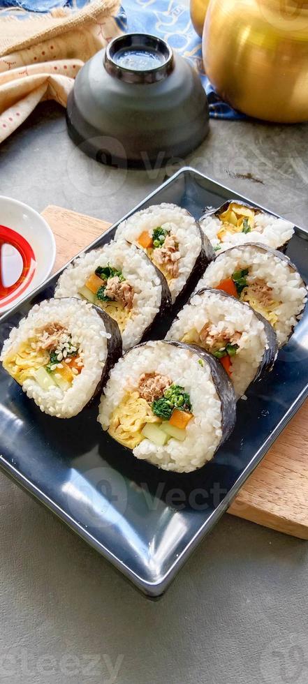 kimbap or gimbap is Korean roll Gimbap, kimbob made from steamed white rice bap and various other ingredients, this food from south korea photo