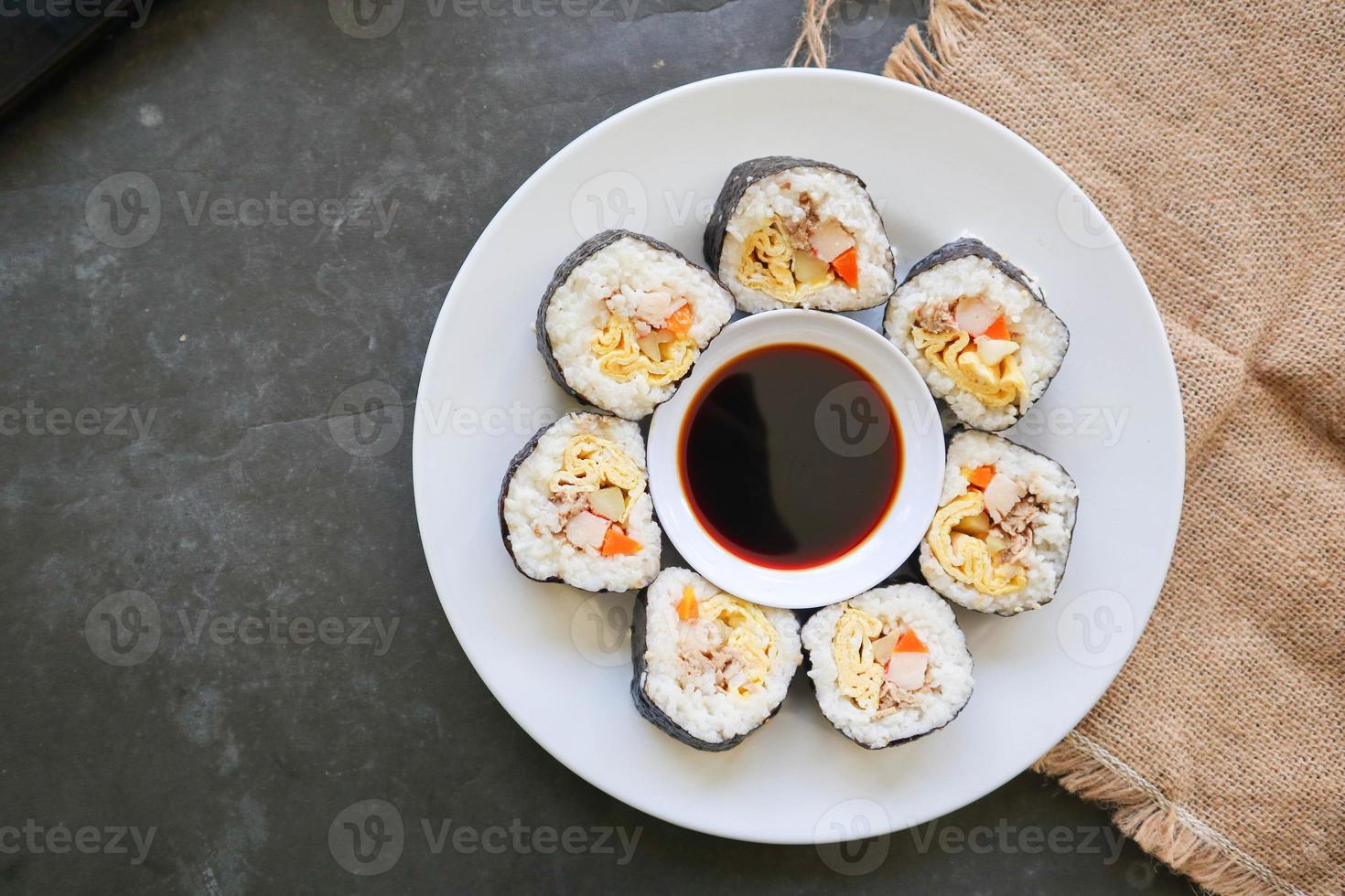 kimbap or gimbap is Korean roll made from steamed white rice  and various other ingredients, this food from south korea photo