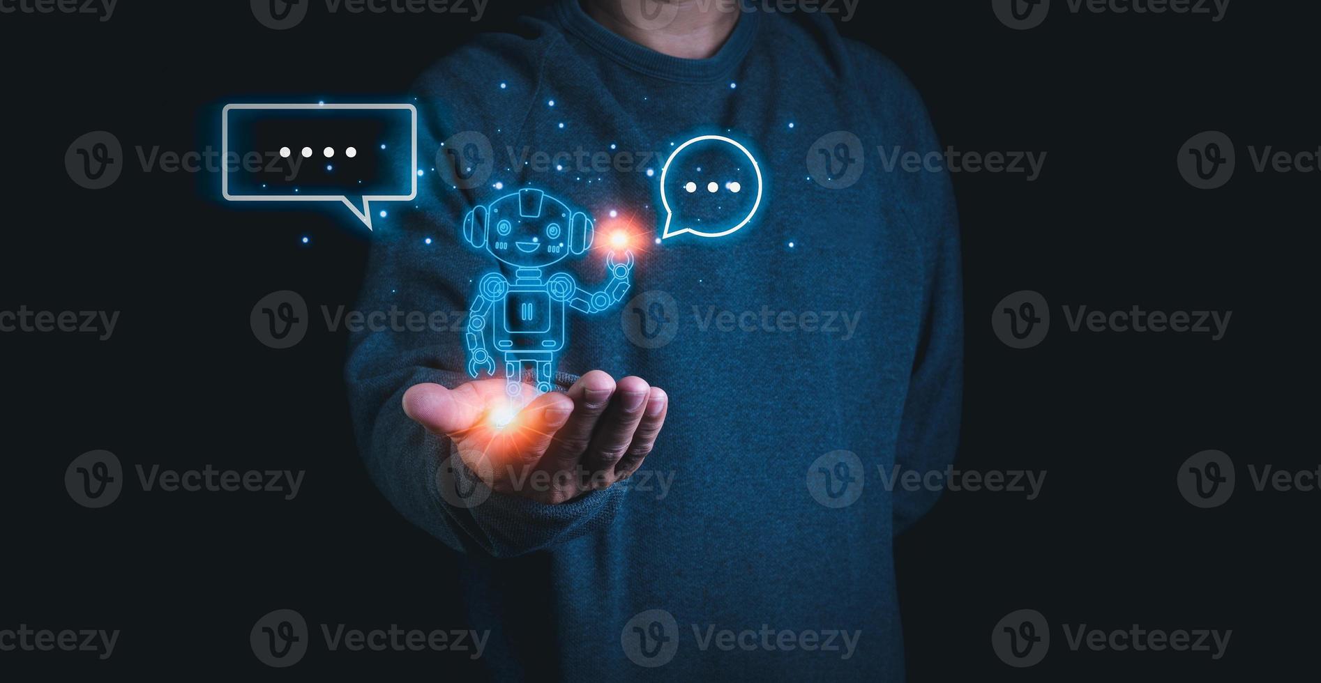 A person stretches out his hand with a model of a robot on his palm. Demonstrates the use of ai and chat GPT systems to research and work. photo