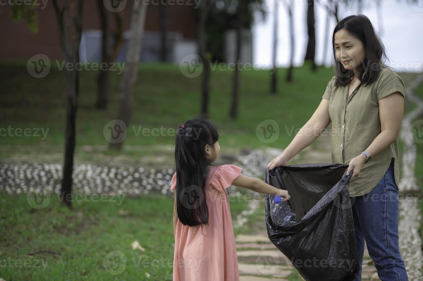 cleaning up forests from plastic pollution, garbage bag under tree, no  people 21509752 Stock Photo at Vecteezy