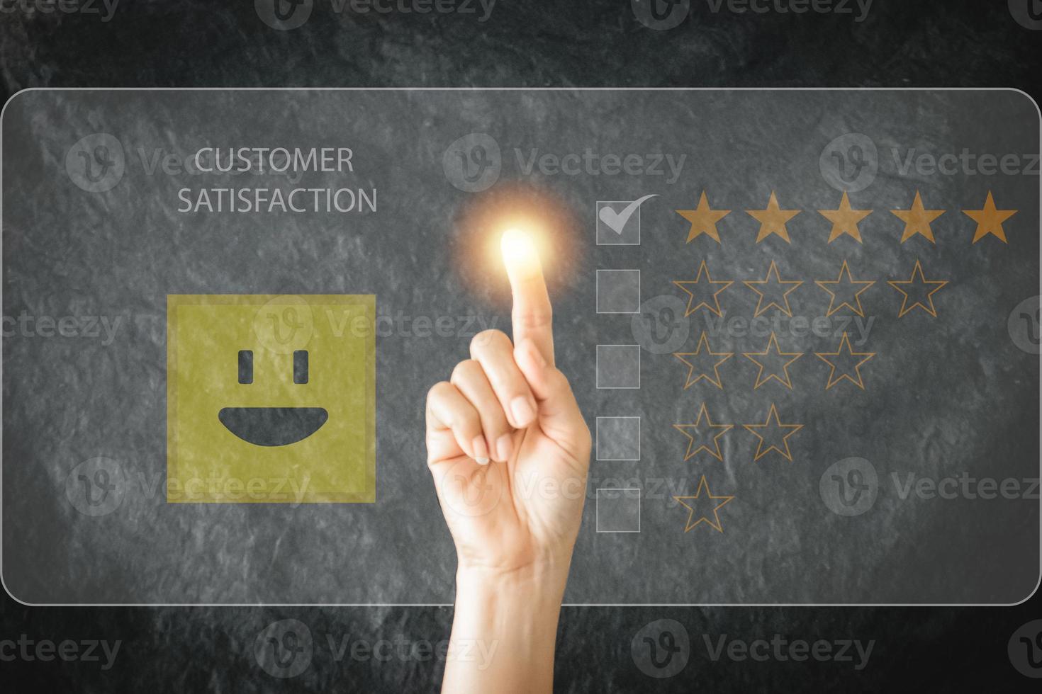 Business pressing star emoticon on virtual touch screen. Customer service evaluation concept. Concept of satisfaction and customer service. business growth. photo