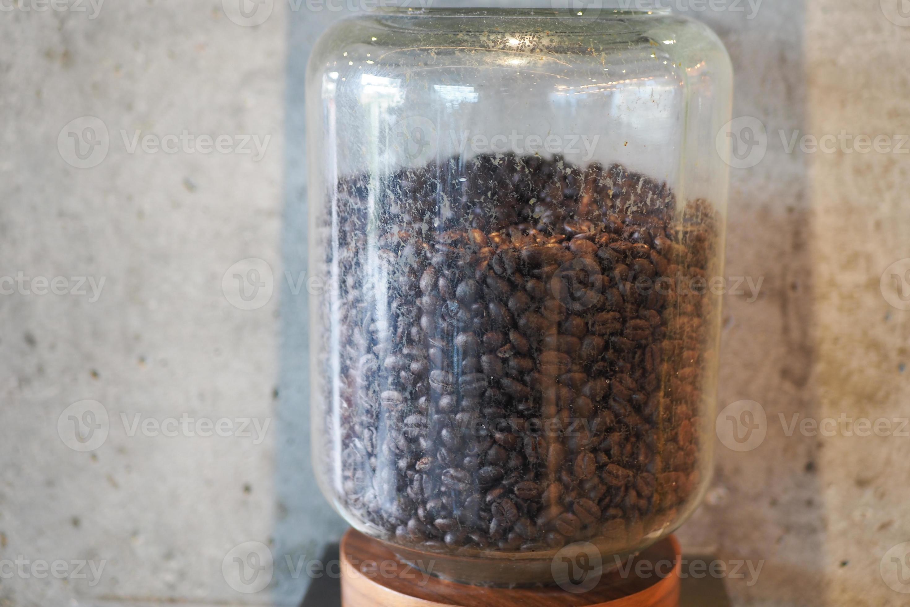 fresh coffee beans stored in a glass jar 21867496 Stock Photo at Vecteezy