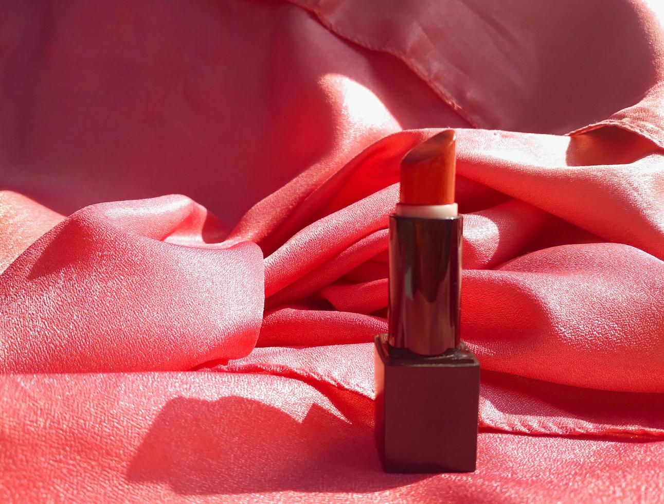 The lipstick is pink on a pink background so it looks elegant, this lipstick is suitable for going to a party or work and looks beautiful on the lips photo