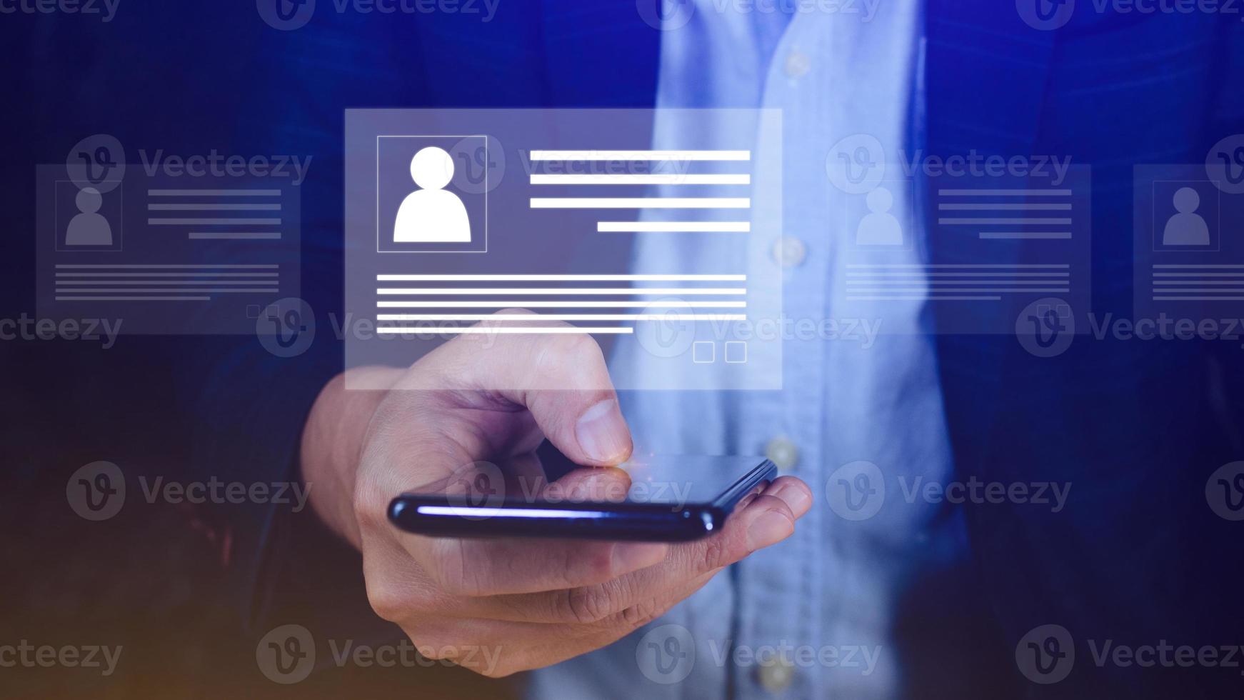 Human resources manager choosing professional profile to hire on virtual screen interface, recruitment concept. Businessman hand pointing icon resource HR management concept photo