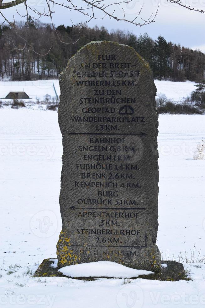 Stone Traffic Sign in Rural Germany photo