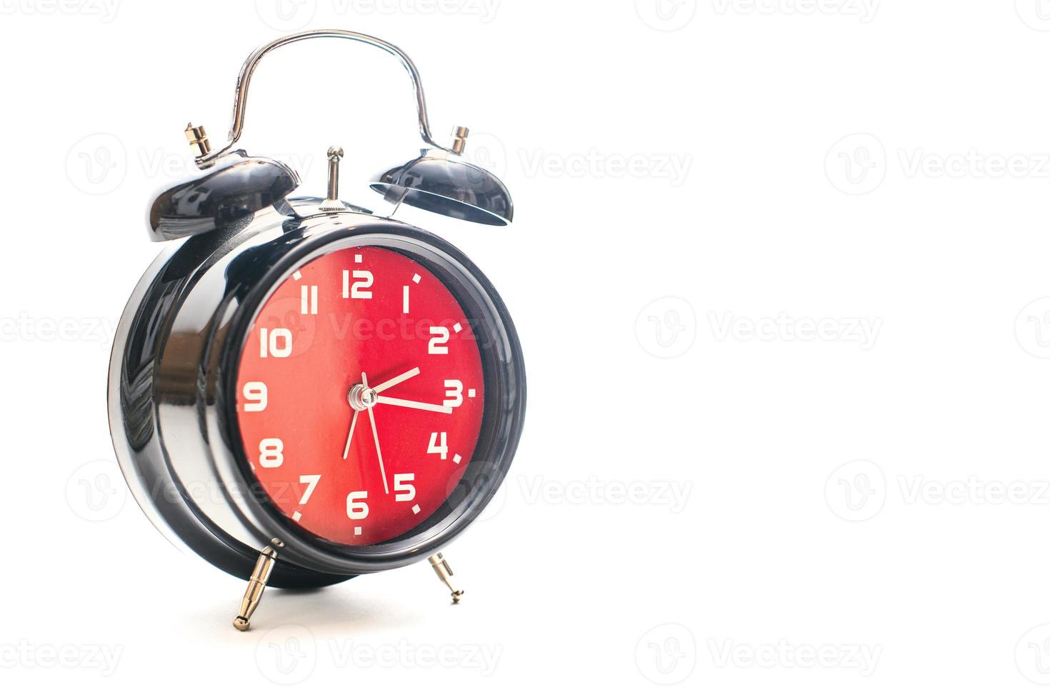 A red and black alarm clock photo