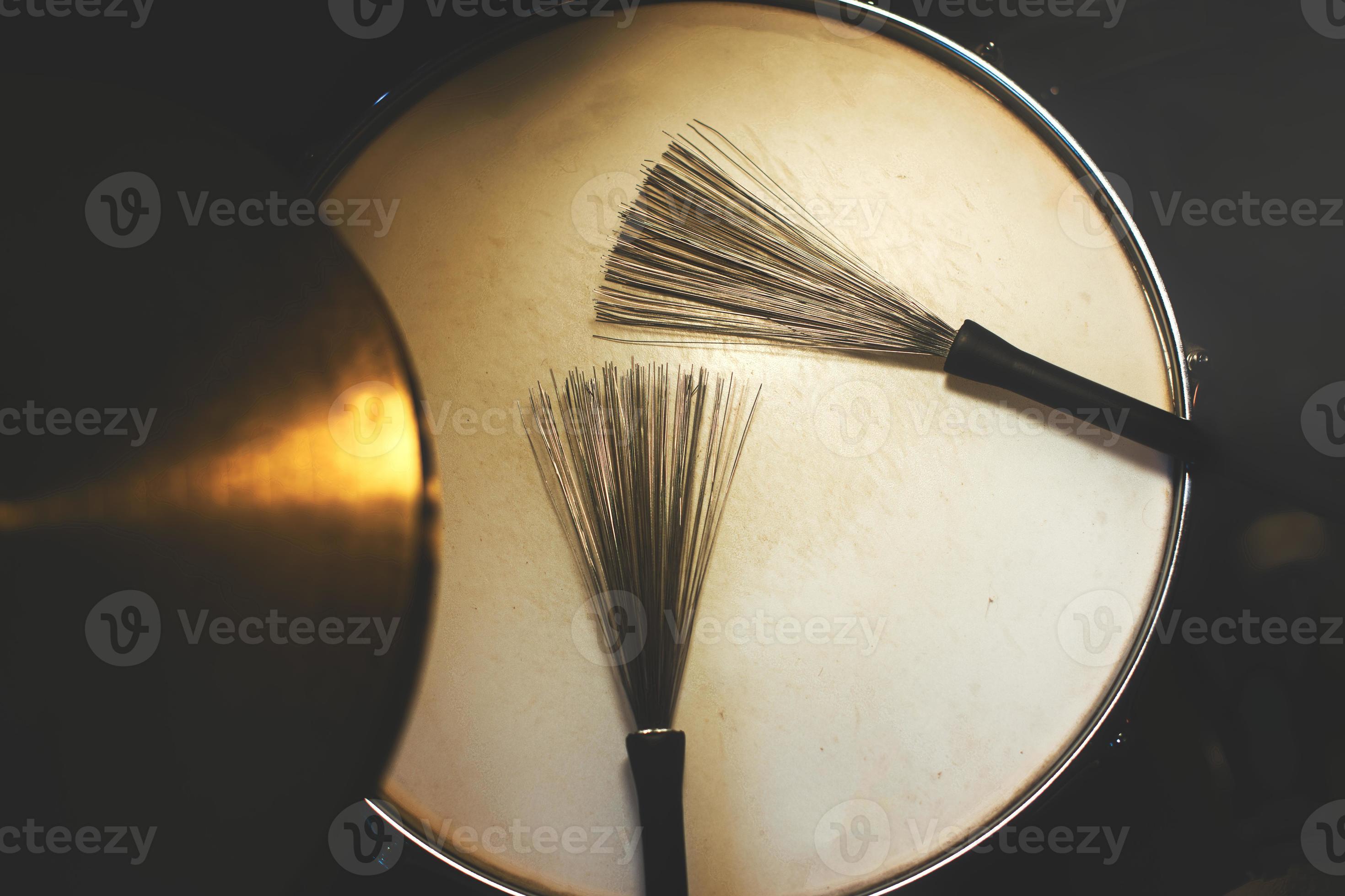 Drum brushes on snare drum 21876273 Stock Photo at Vecteezy