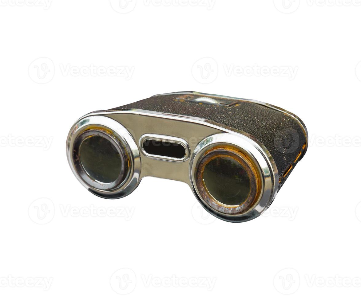 Old binoculars on white photo