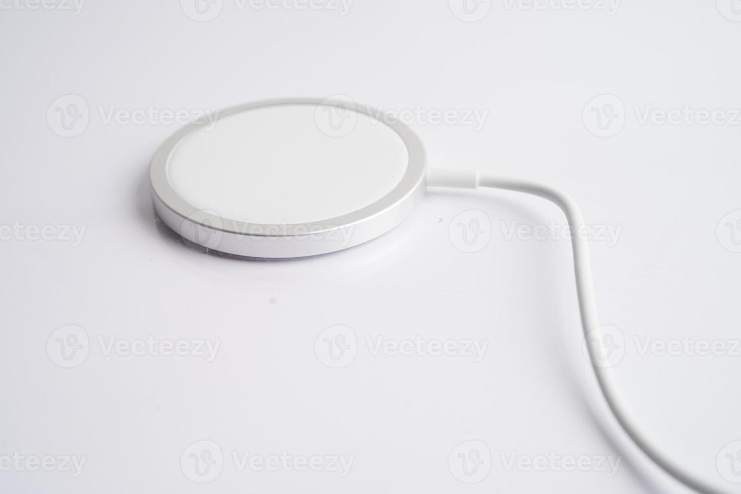 Wireless charger, magnetic charging modern equipment of mobile phone. photo