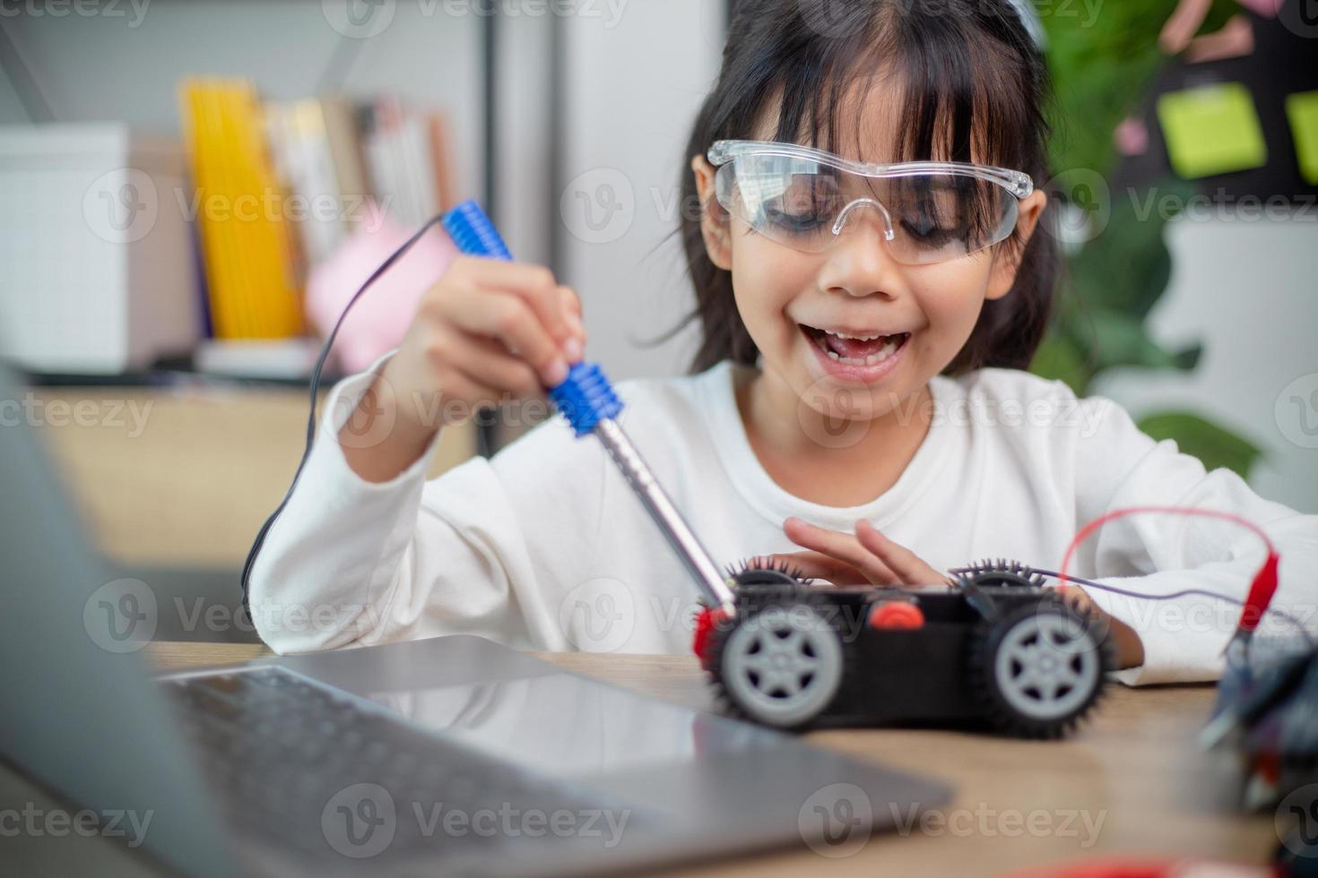 Asia students learn at home in coding robot cars and electronic board ...