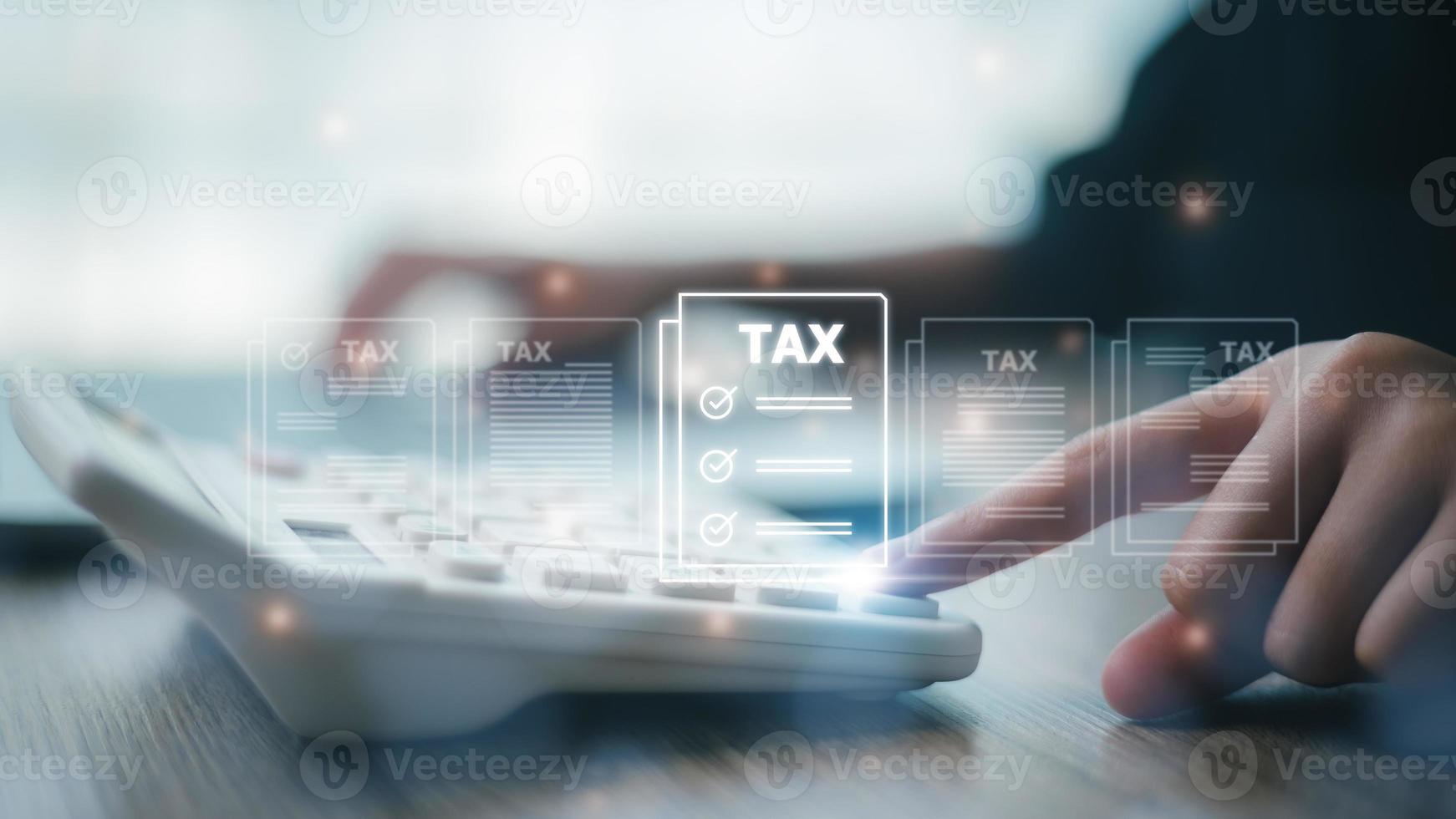 Corporate and individual tax payment concept, woman using computer filling out corporate and personal income tax return, VAT and property tax of business. photo