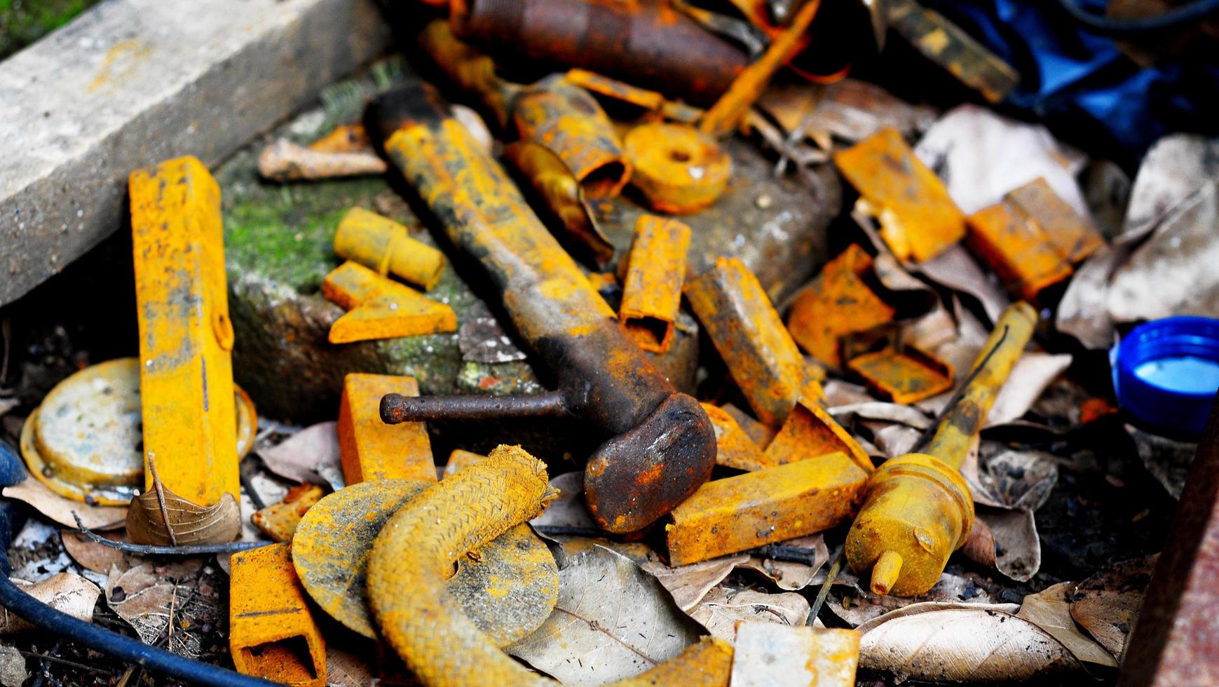 closeup of coal and rusty iron in factory, dirty metal background yellow images photo