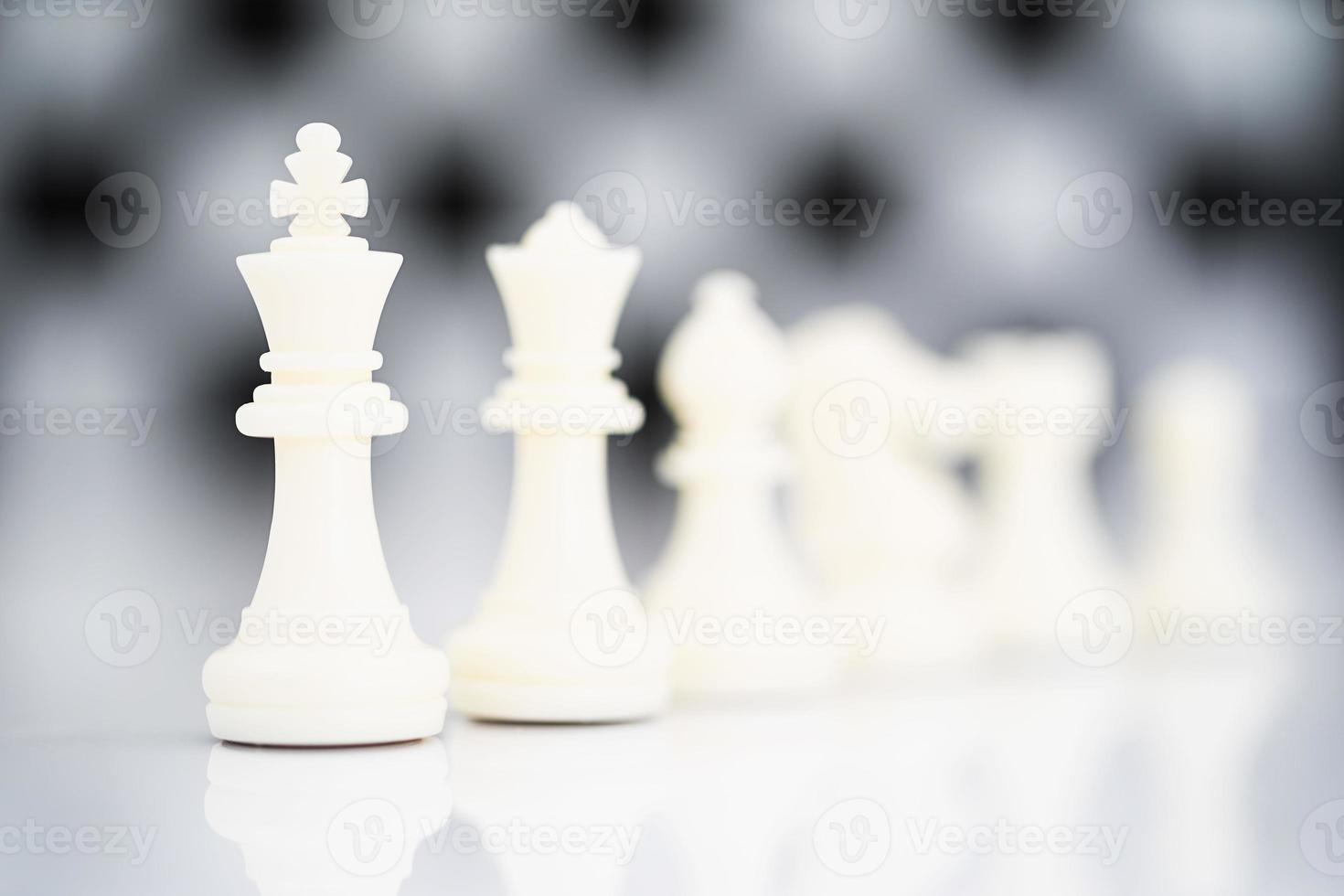 Set of white chess pieces on white background photo