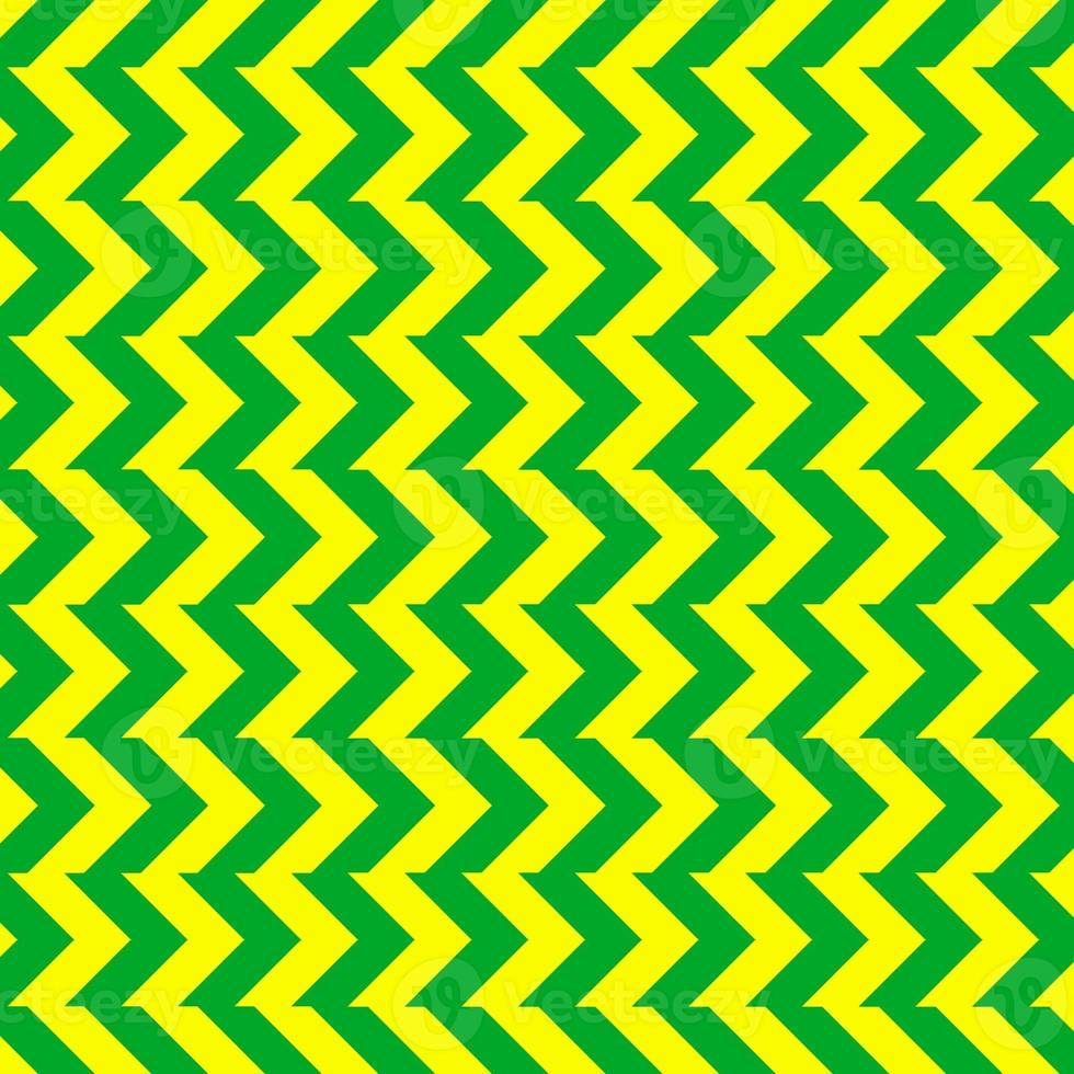 clásico verde y amarillo cheurón sin costura modelo. sin costura zig zag modelo antecedentes. regular textura antecedentes. adecuado para póster, folleto, folleto, fondo, tarjeta, etc. foto