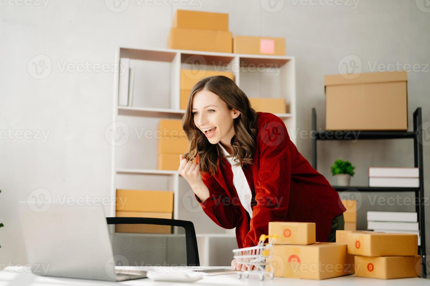 Small business entrepreneur SME freelance woman working at office, BOX,tablet and laptop online, marketing, packaging, delivery,  e-commerce concept photo