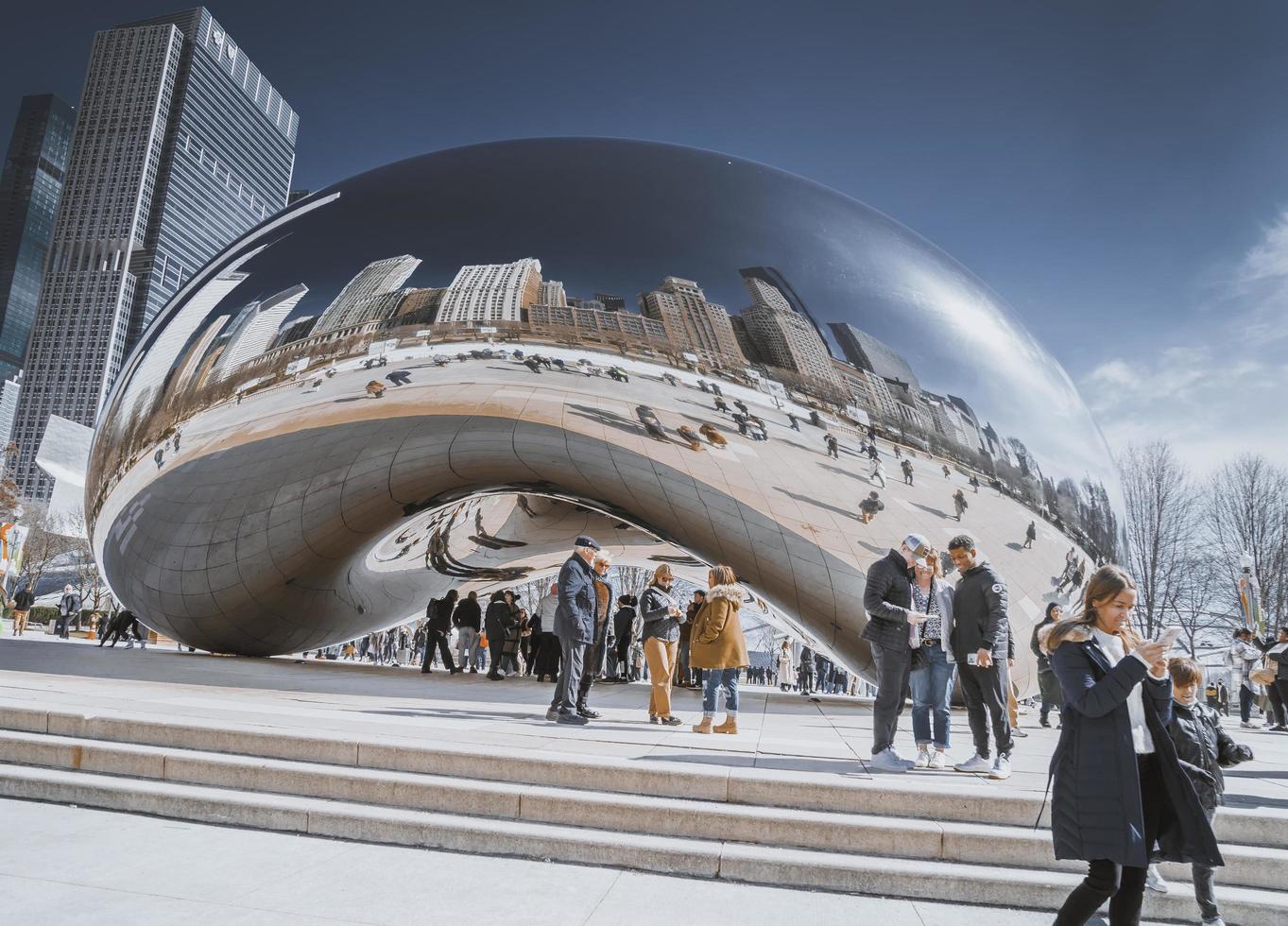 March 4 2023. Chicago, Illinois. The Bean is a work of public art in the heart of Chicago. The sculpture, which is titled Cloud Gate, is one of the worlds largest permanent outdoor art installations. photo