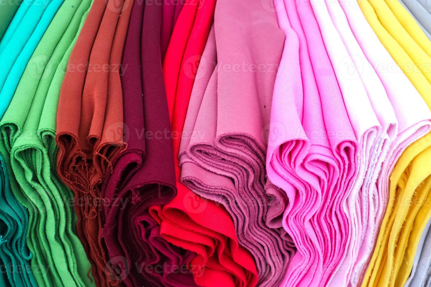 View on samples of cloth and fabrics in different colors found at a german fabrics market. photo