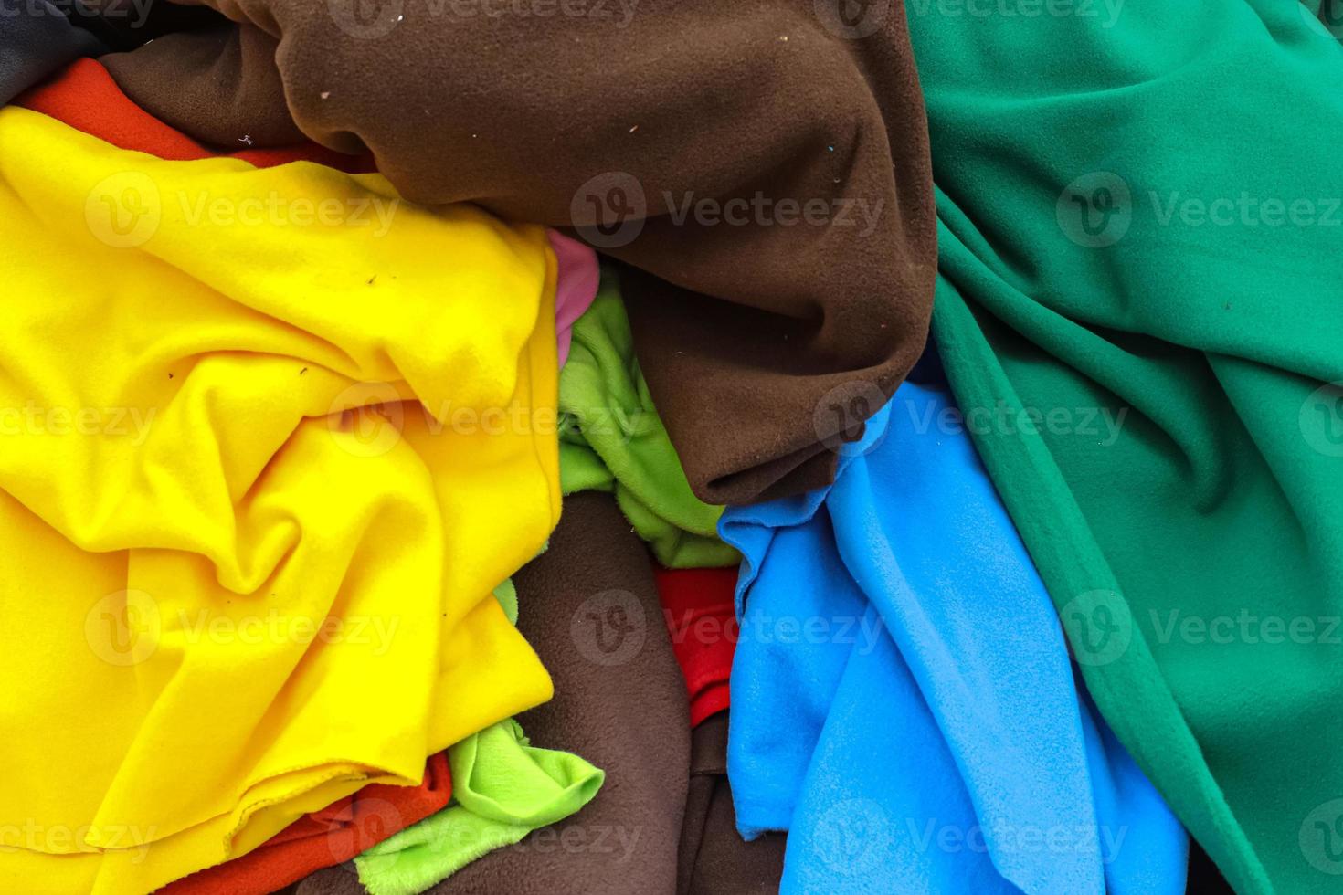 View on samples of cloth and fabrics in different colors found at a german fabrics market. photo