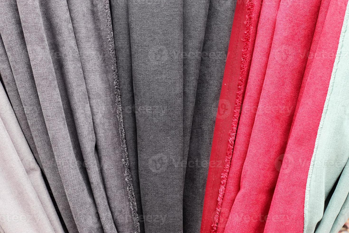 View on samples of cloth and fabrics in different colors found at a german fabrics market. photo